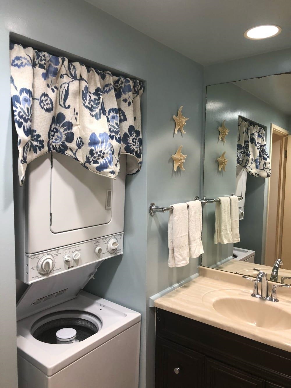 3875 Lower Honoapiilani Road, Unit A105 Lahaina, HI 96761 - Photo 14 of 27 a bathroom with a sink and a mirror