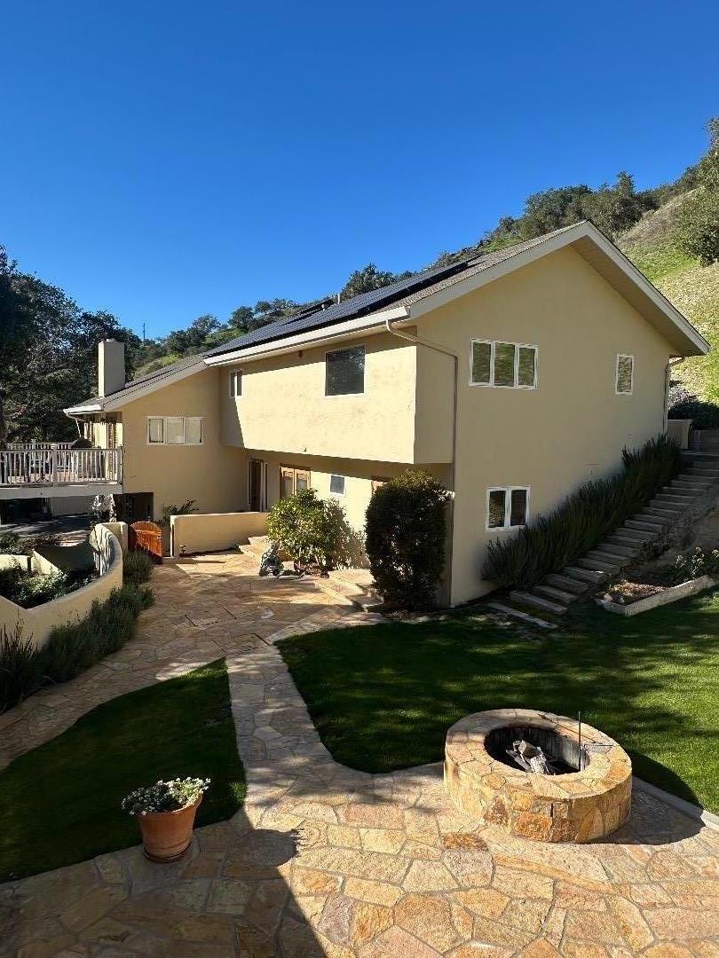 442 Corral De Tierra Road Salinas, CA 93908 - Photo 1 of 46 a view of a backyard with table and chairs and potted plants