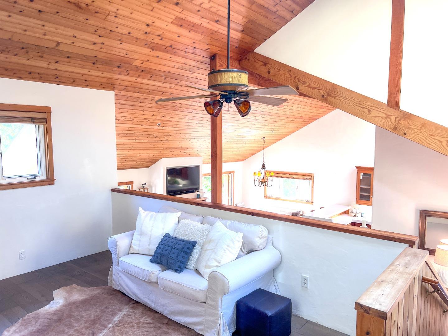 442 Corral De Tierra Road Salinas, CA 93908 - Photo 17 of 46 a living room with couches and painted walls with balcony