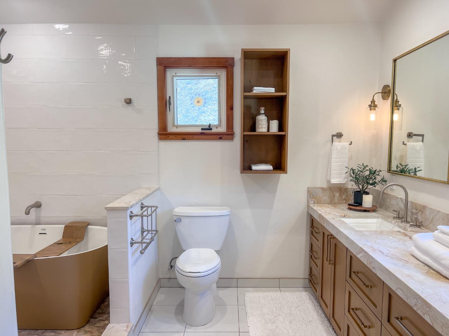 442 Corral De Tierra Road Salinas, CA 93908 - Photo 26 of 48 a bathroom with a granite countertop toilet sink and mirror