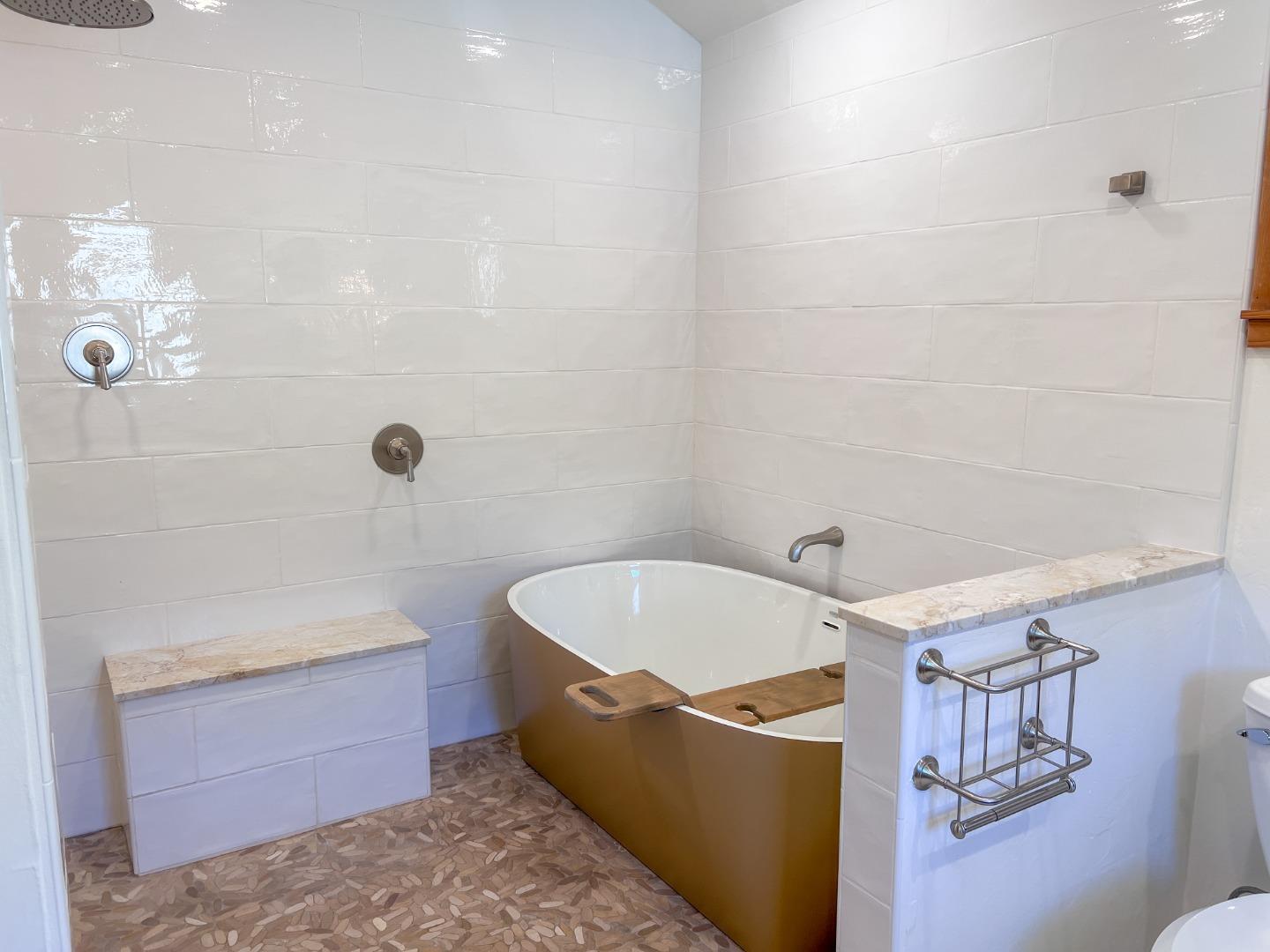 442 Corral De Tierra Road Salinas, CA 93908 - Photo 26 of 46 a bathroom with a tub a sink and a shower