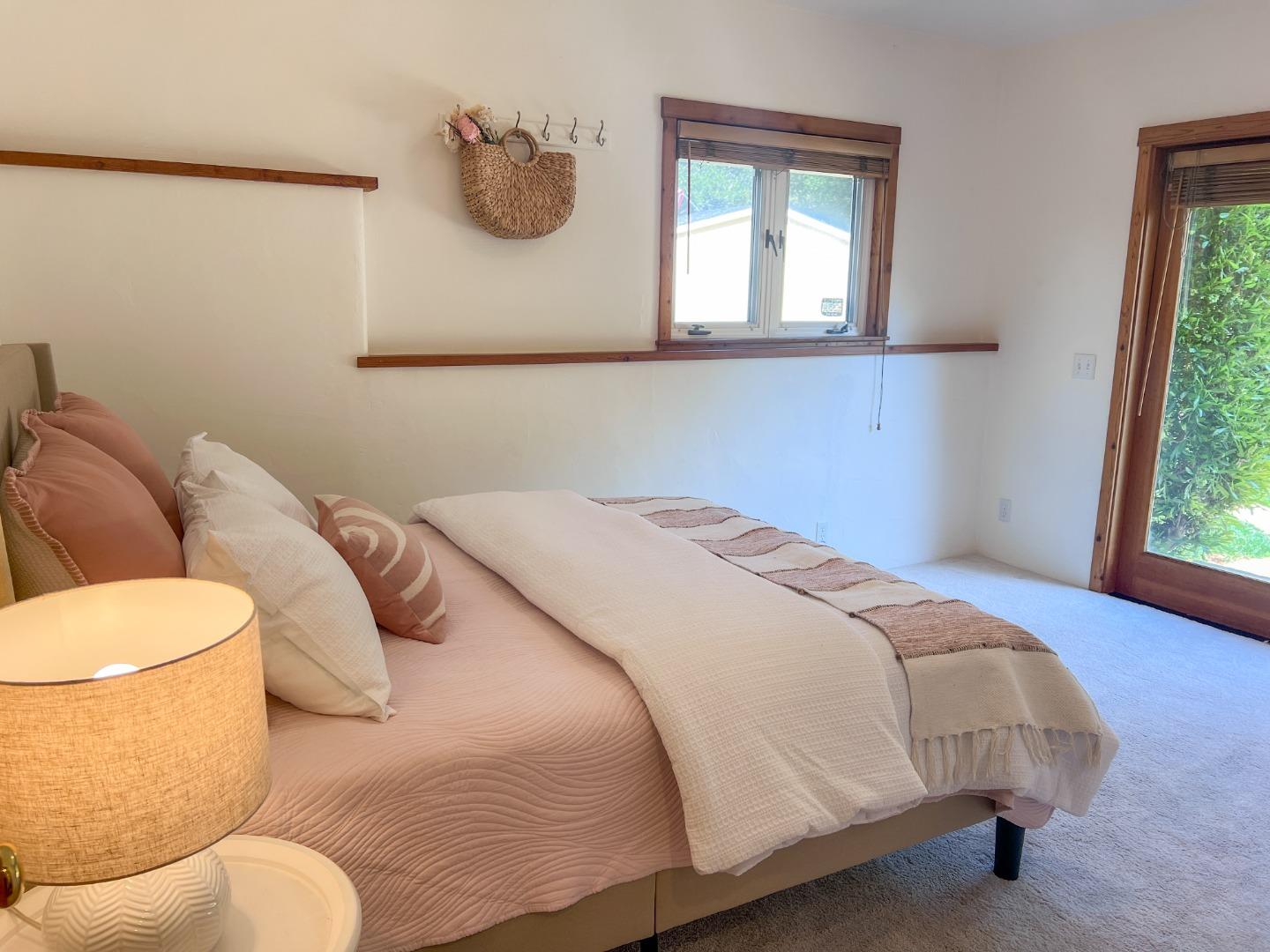 442 Corral De Tierra Road Salinas, CA 93908 - Photo 29 of 48 a bedroom with a bed and a window