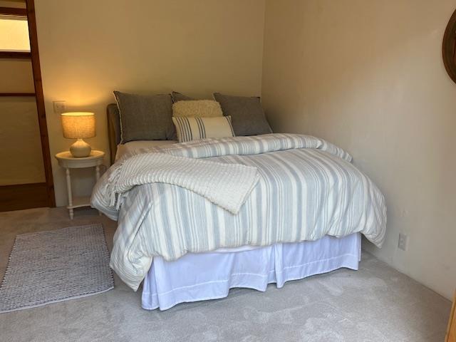 442 Corral De Tierra Road Salinas, CA 93908 - Photo 32 of 48 a bedroom with a bed and a night stand