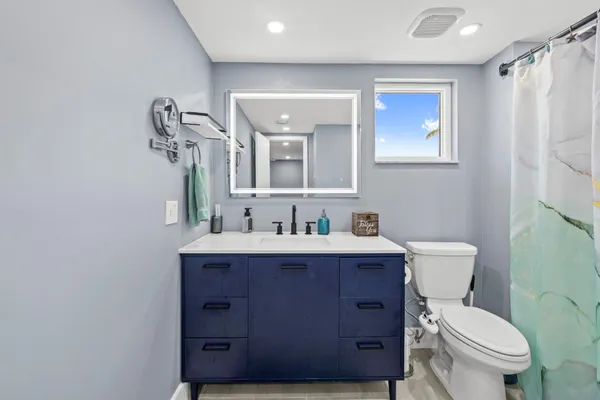 a view of a hallway with washer and dryer