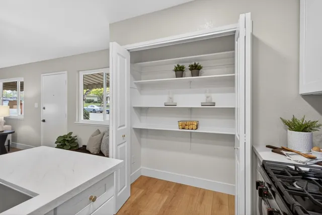 a room with storage and utility room