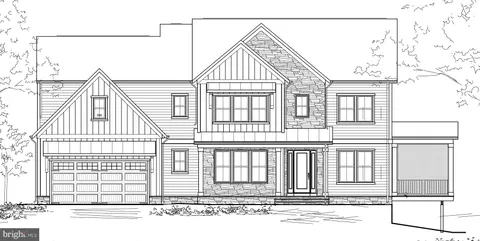 a view of a brick house with large windows