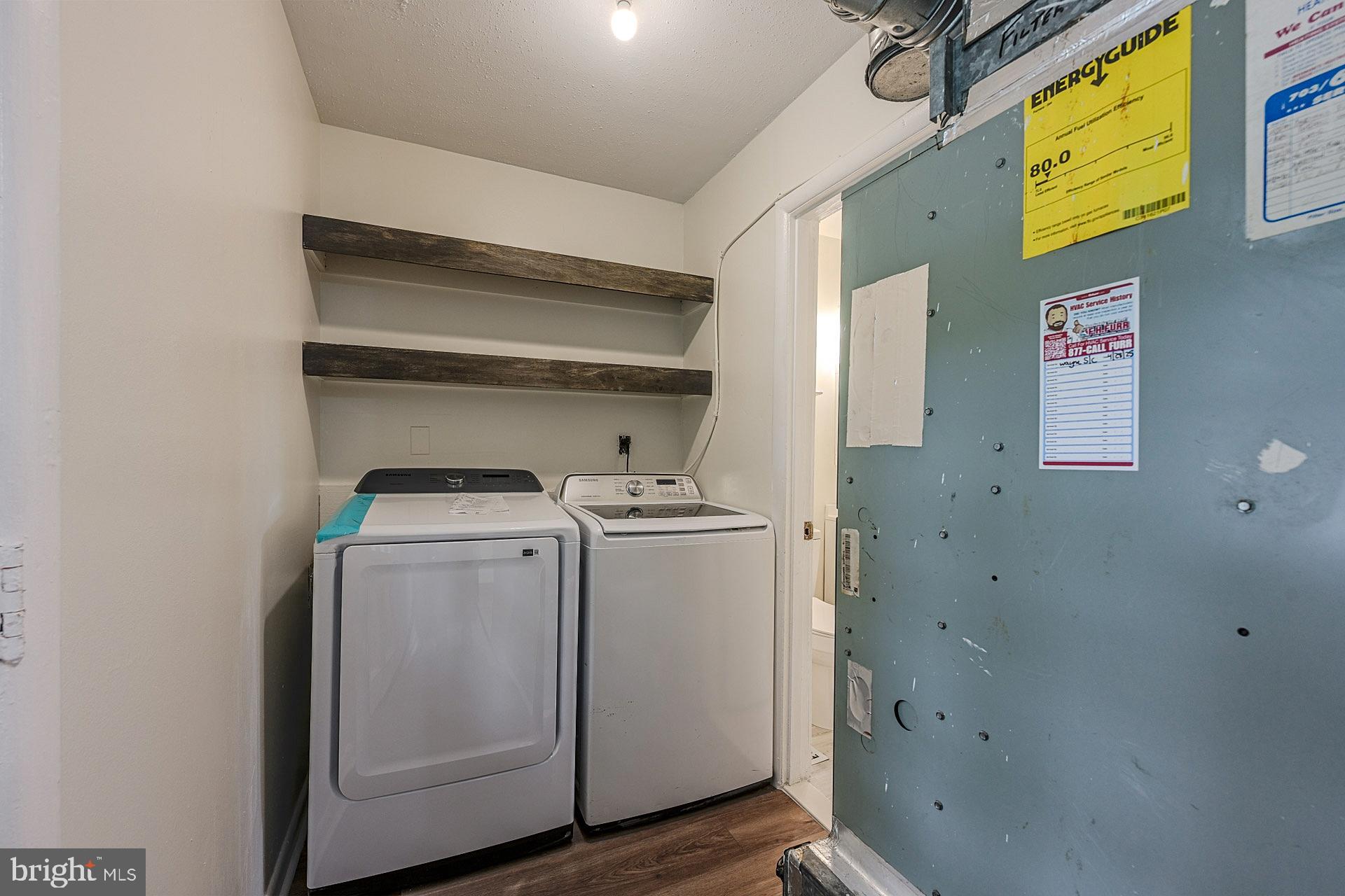 6728 Bowie Drive Springfield, VA 22150 - Photo 12 of 26 a utility room with dryer and washer