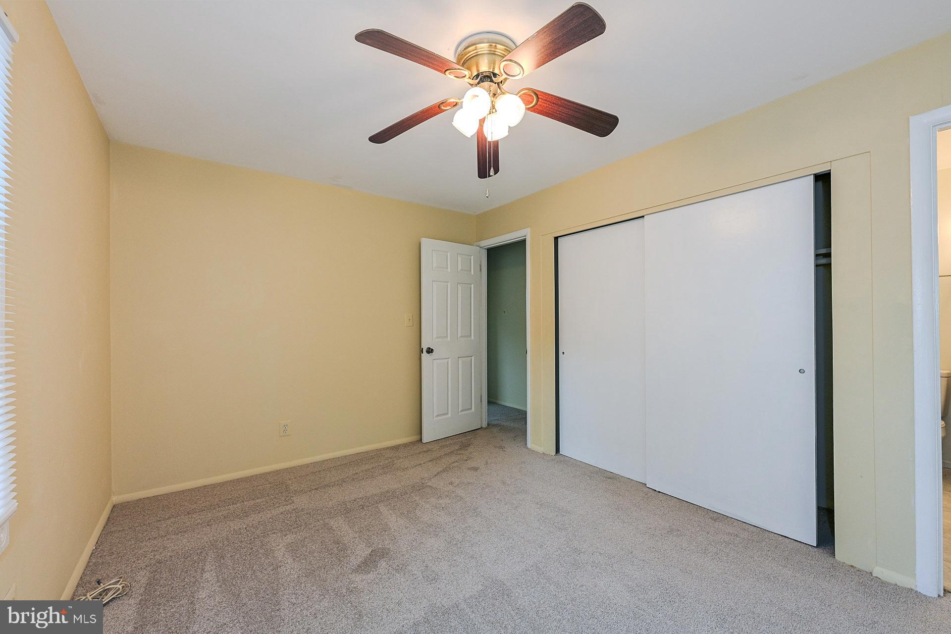 6728 Bowie Drive Springfield, VA 22150 - Photo 15 of 26 a view of a room with a ceiling fan and a fan