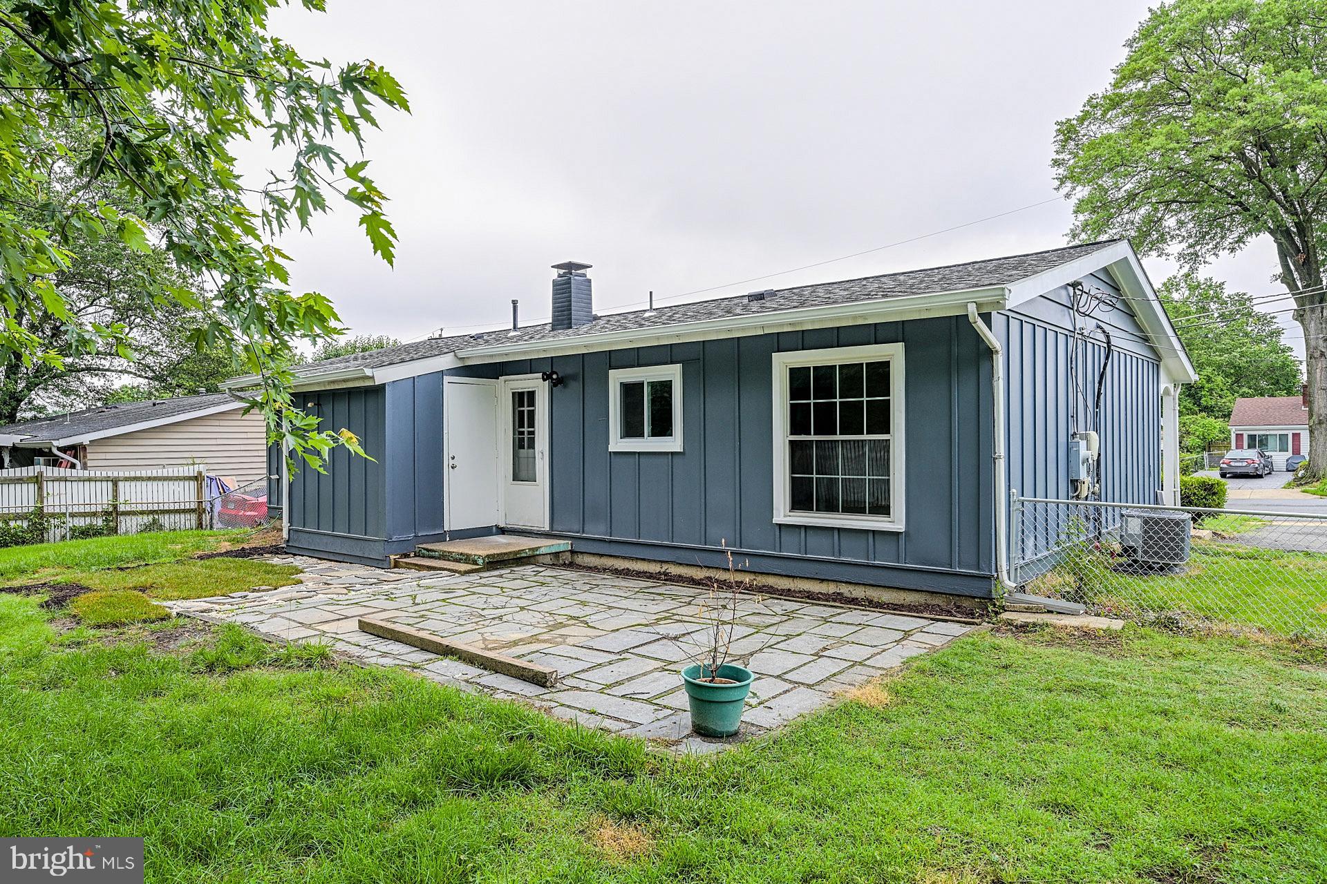 6728 Bowie Drive Springfield, VA 22150 - Photo 23 of 26 a front view of a house with garden