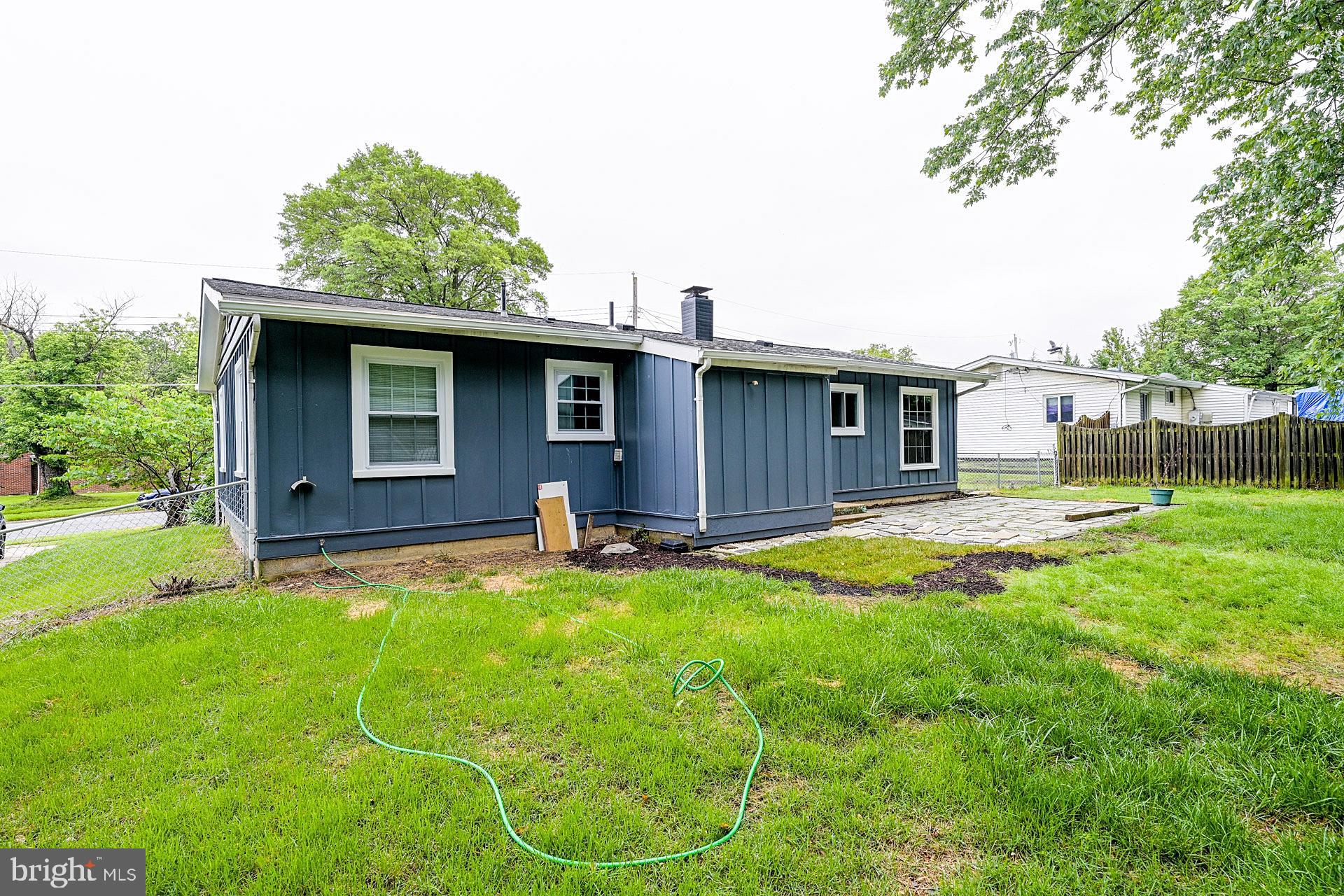 6728 Bowie Drive Springfield, VA 22150 - Photo 24 of 26 a house view with swimming pool in front of it