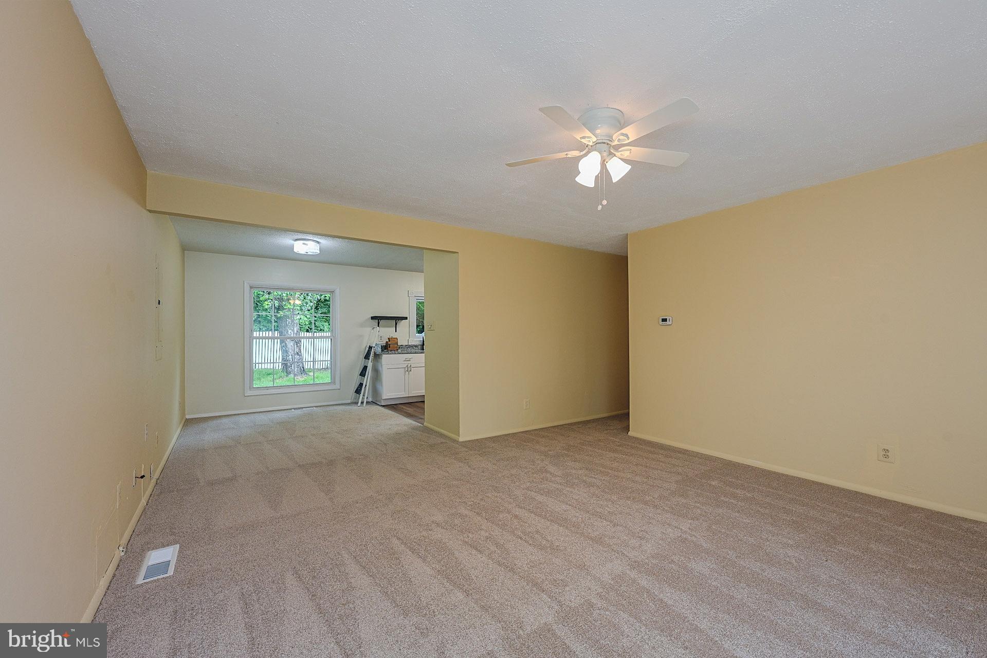 6728 Bowie Drive Springfield, VA 22150 - Photo 4 of 26 a view of a livingroom with a window