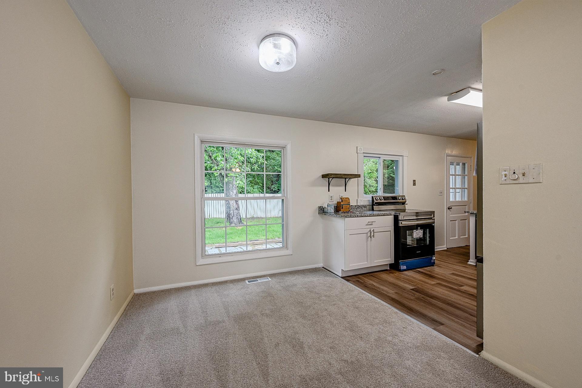 6728 Bowie Drive Springfield, VA 22150 - Photo 6 of 26 a view of a kitchen with a sink and a window