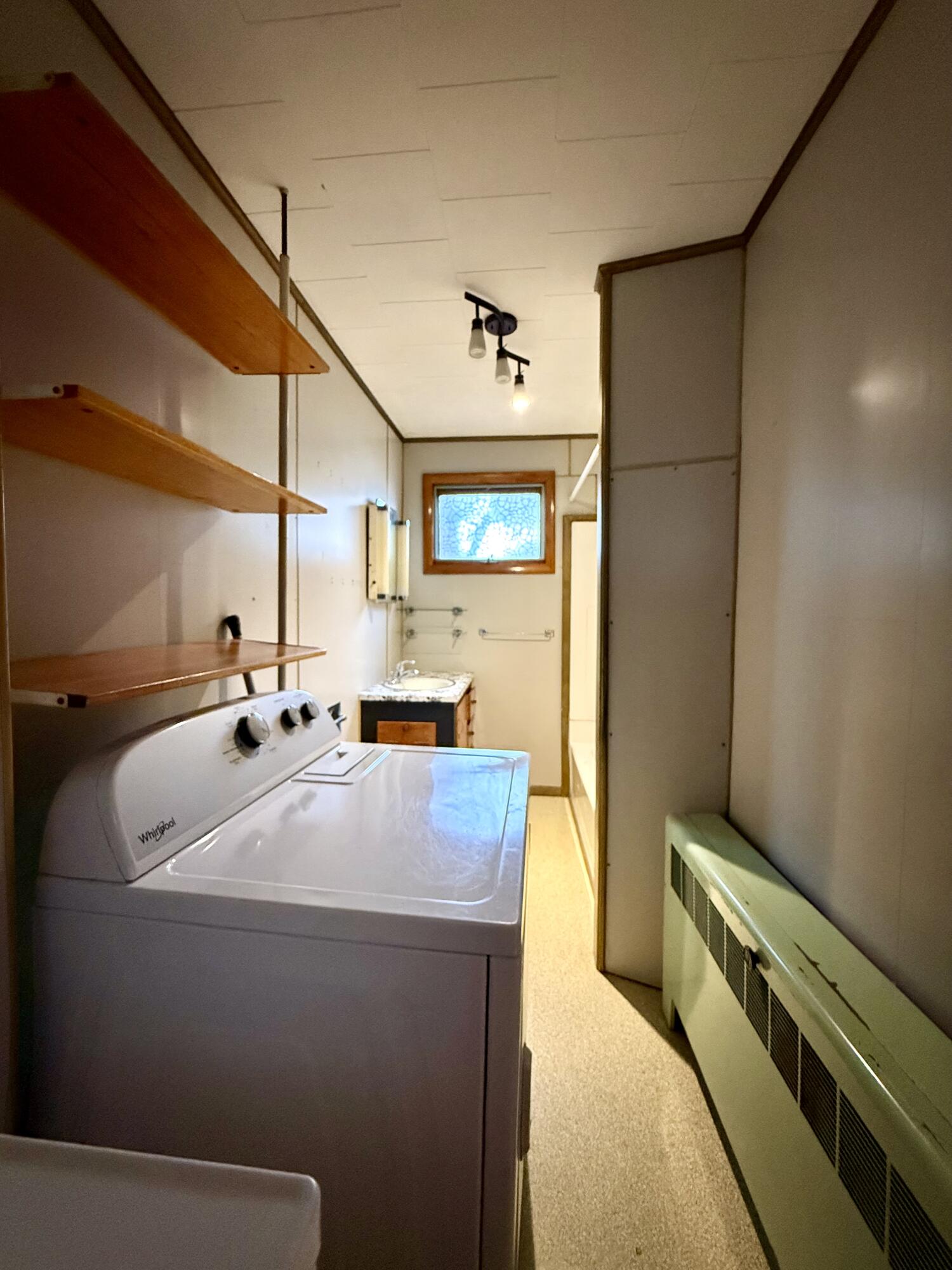 91 Downes Street Calais, ME 04619 - Photo 13 of 62 Full bathroom and laundry combined