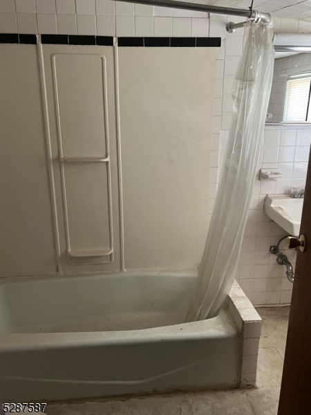 a bathroom with a bathtub