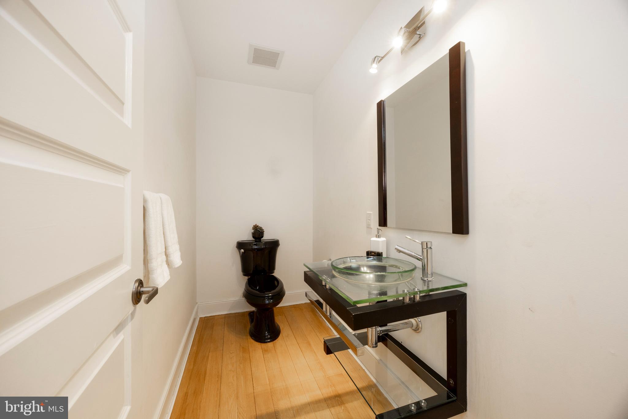 115 Bullock Road Chadds Ford, PA 19317 - Photo 15 of 50 a bathroom with a sink mirror and vanity