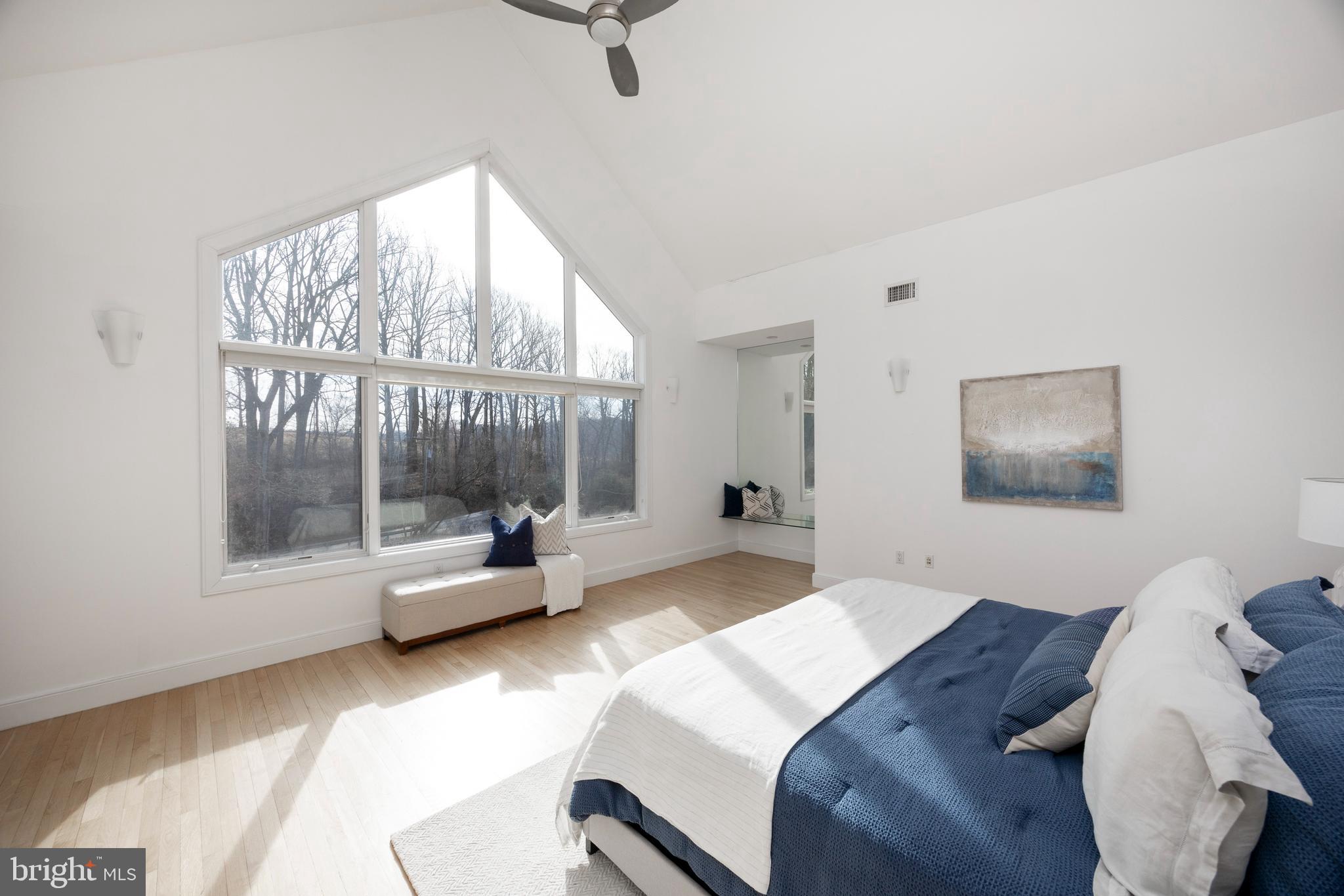 115 Bullock Road Chadds Ford, PA 19317 - Photo 18 of 50 a bedroom with a bed and glass window