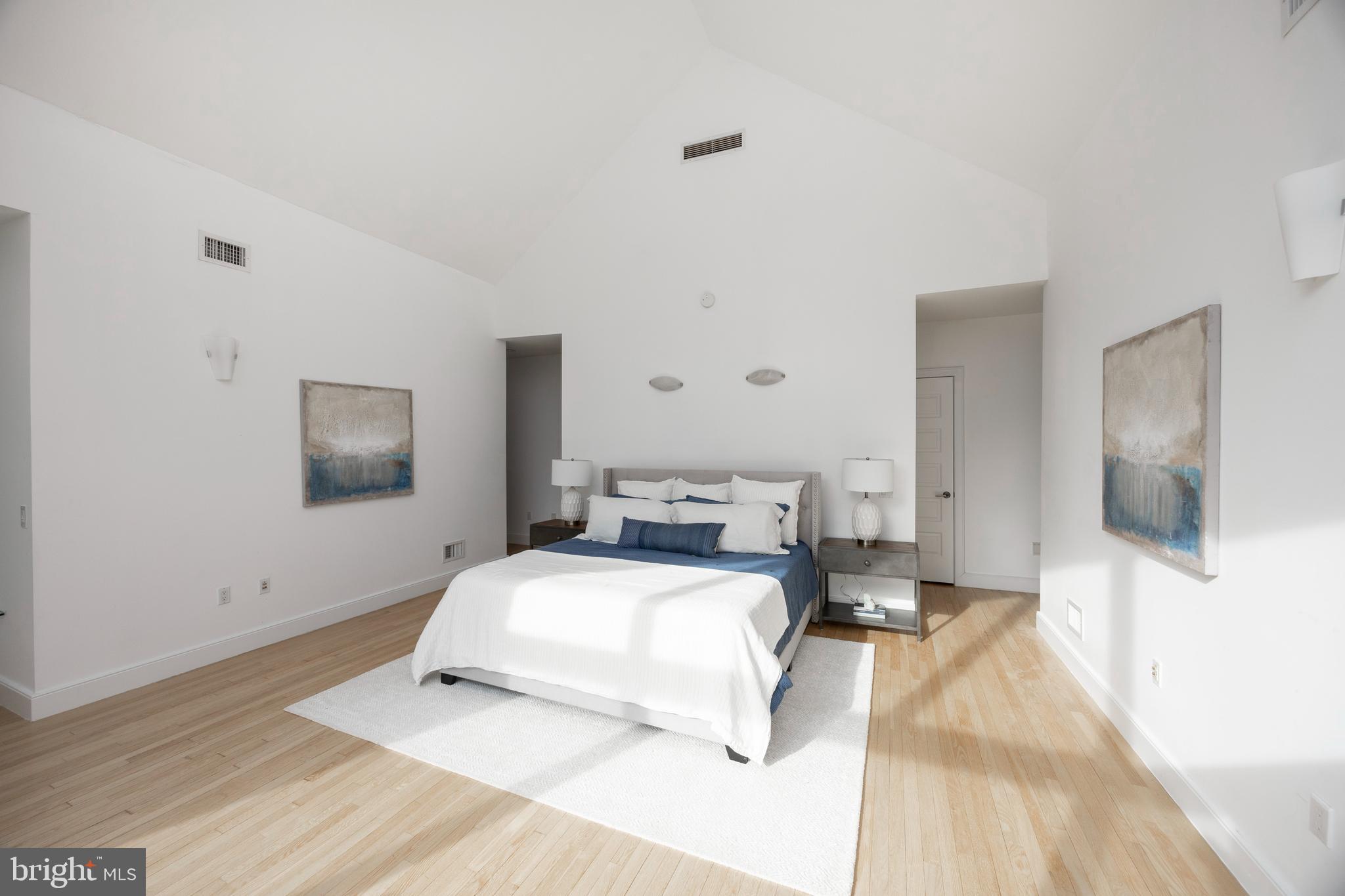 115 Bullock Road Chadds Ford, PA 19317 - Photo 20 of 50 a bedroom with a bed and flat screen tv