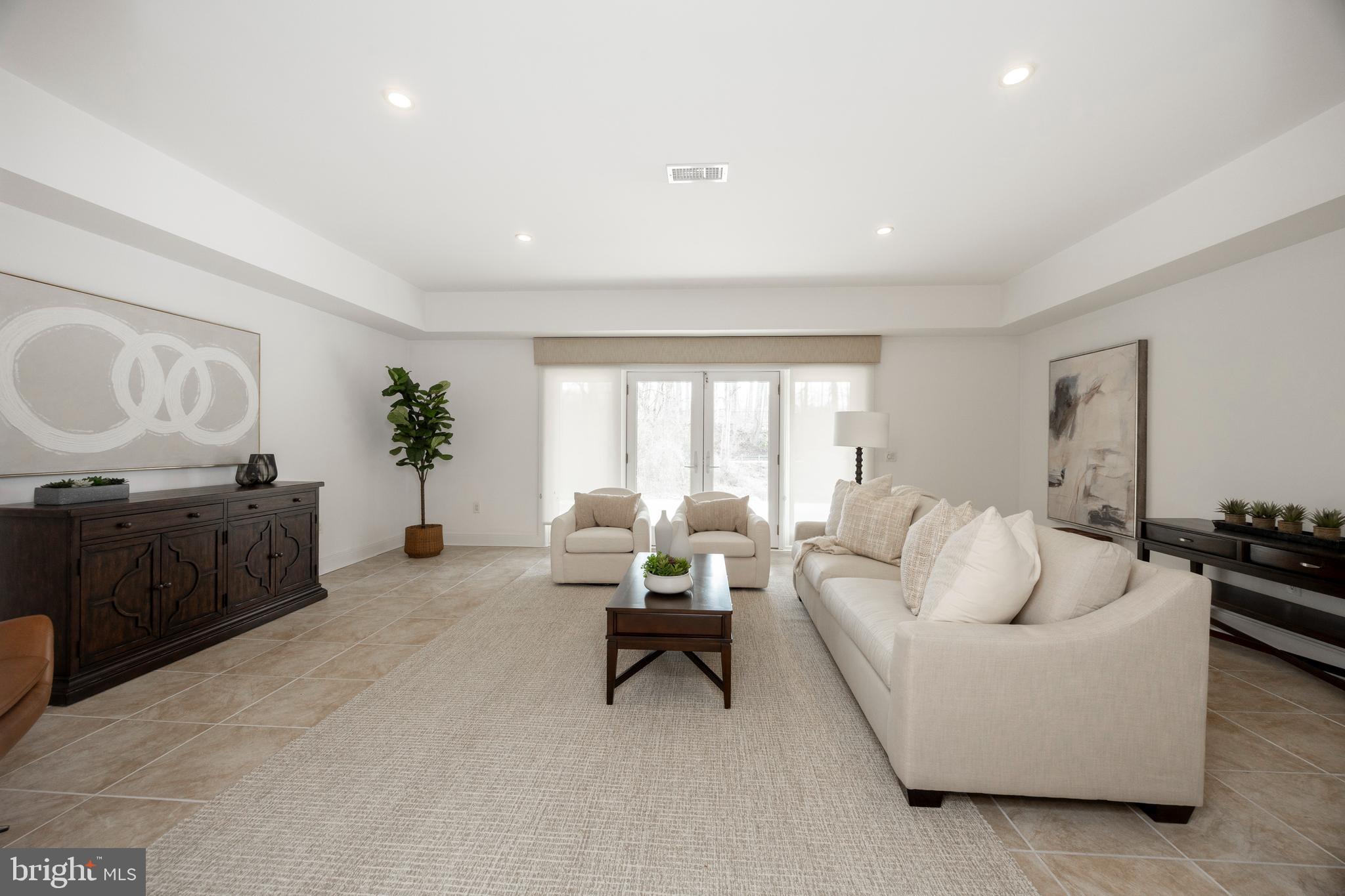115 Bullock Road Chadds Ford, PA 19317 - Photo 33 of 50 a living room with furniture and a large window