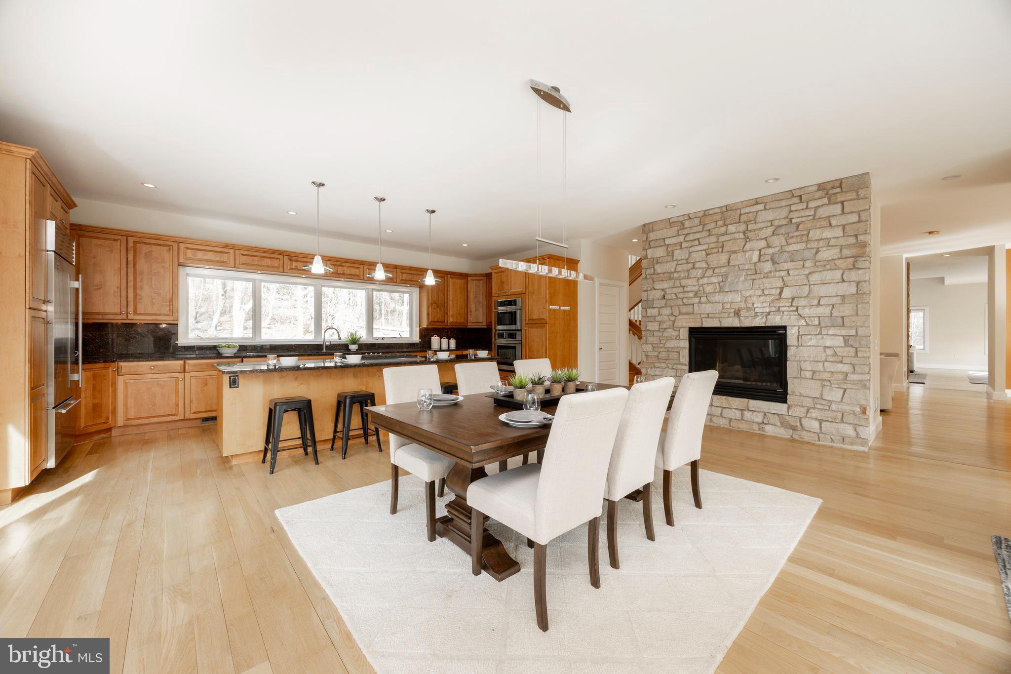 115 Bullock Road Chadds Ford, PA 19317 - Photo 4 of 50 a living room with furniture and a fireplace