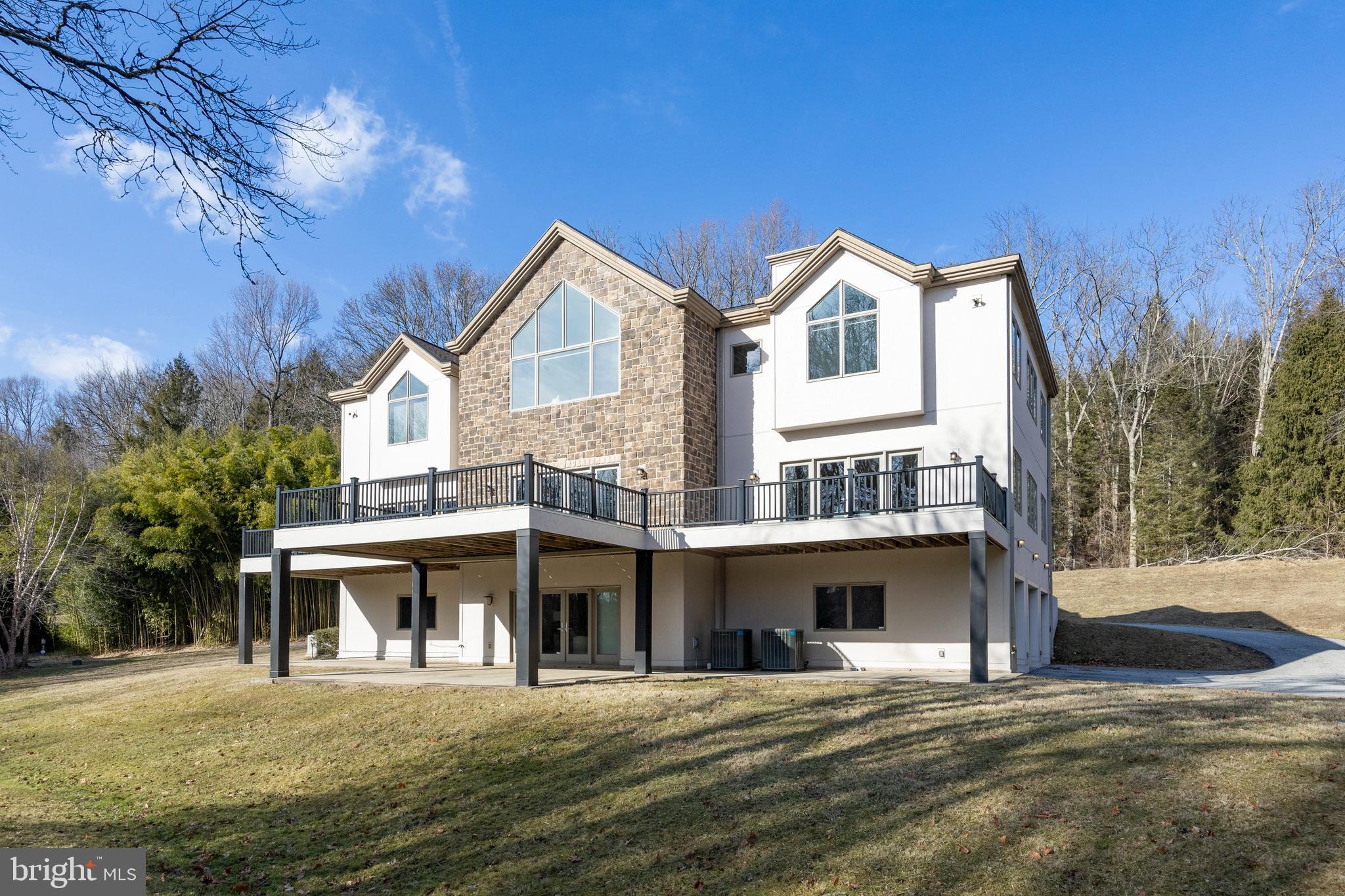 115 Bullock Road Chadds Ford, PA 19317 - Photo 45 of 50 a front view of a house with a yard