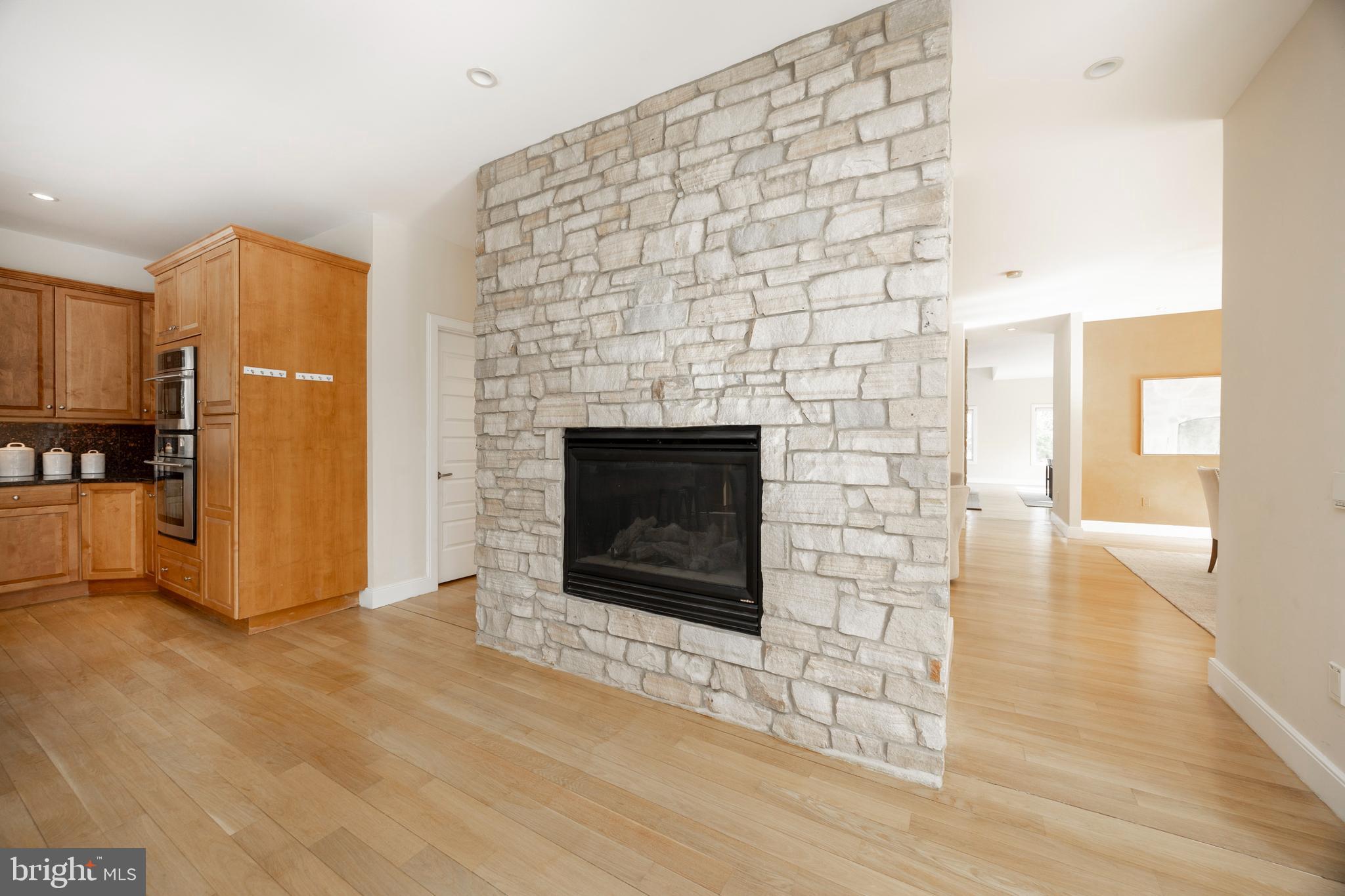 115 Bullock Road Chadds Ford, PA 19317 - Photo 5 of 50 a living room with a fireplace