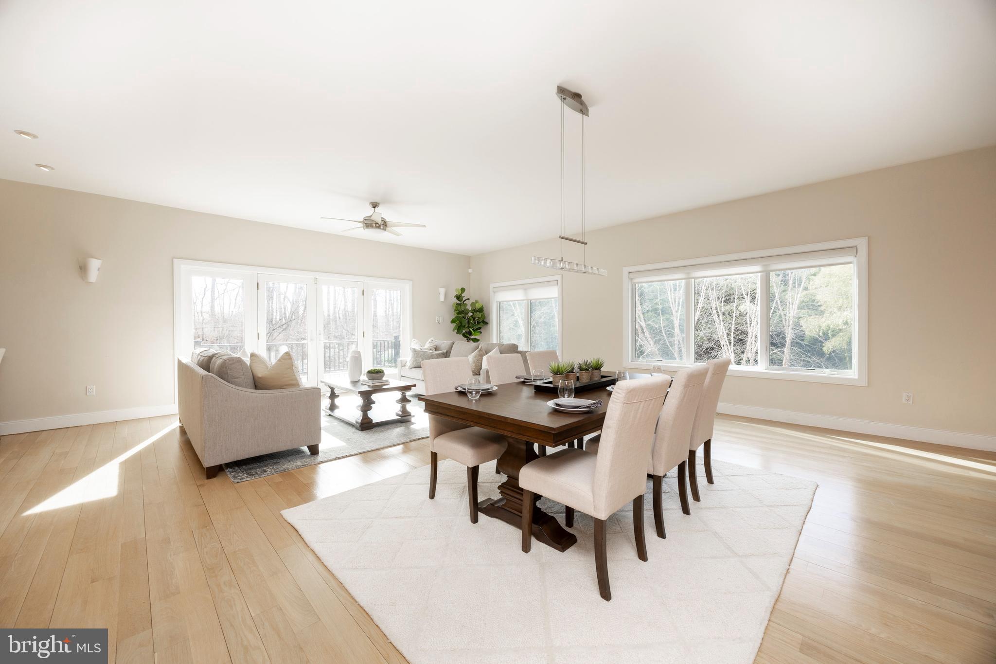 115 Bullock Road Chadds Ford, PA 19317 - Photo 6 of 50 a view of a dining room with furniture and wooden floor