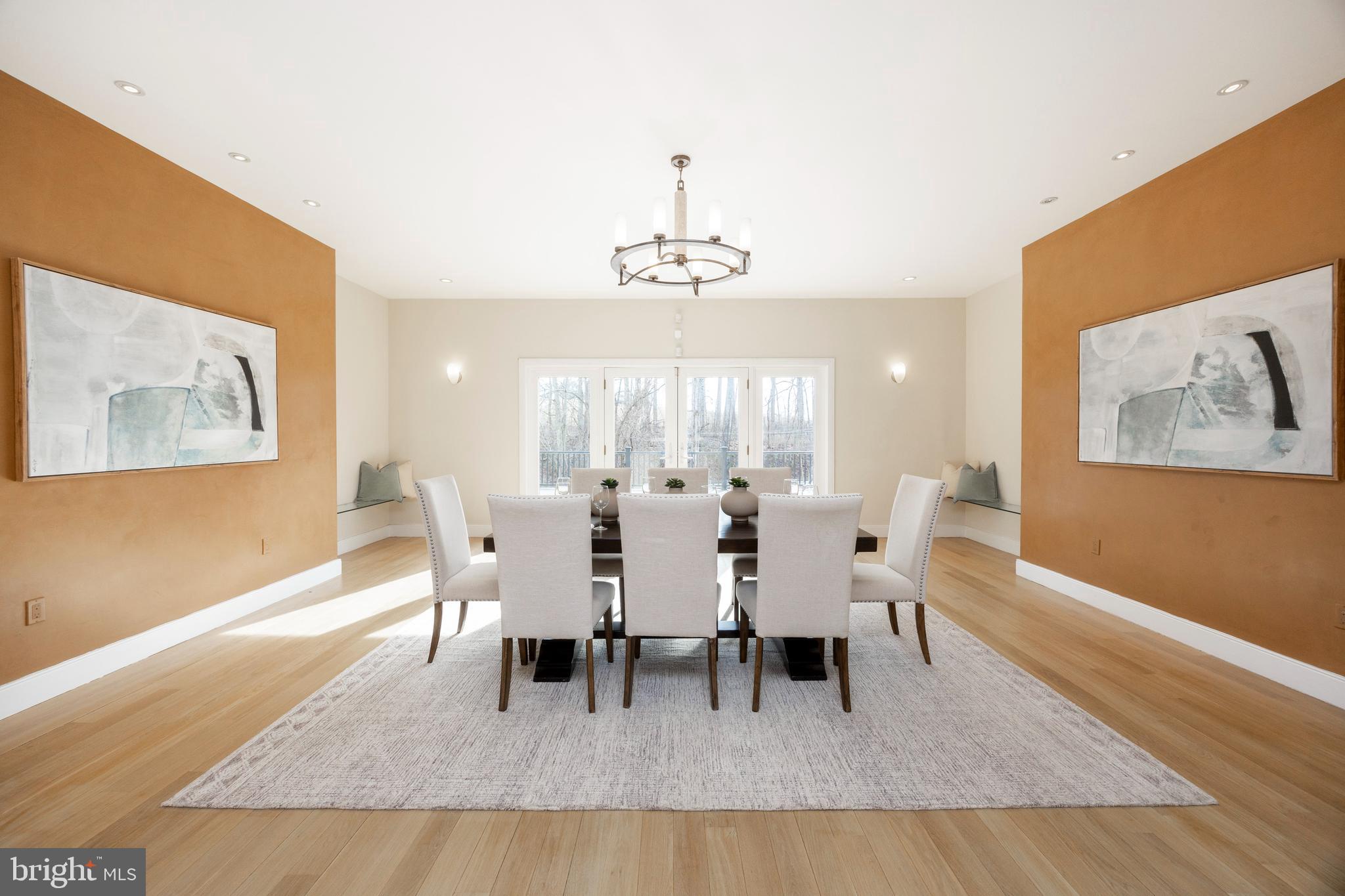 115 Bullock Road Chadds Ford, PA 19317 - Photo 9 of 50 a dining room with wooden floor and a chandelier