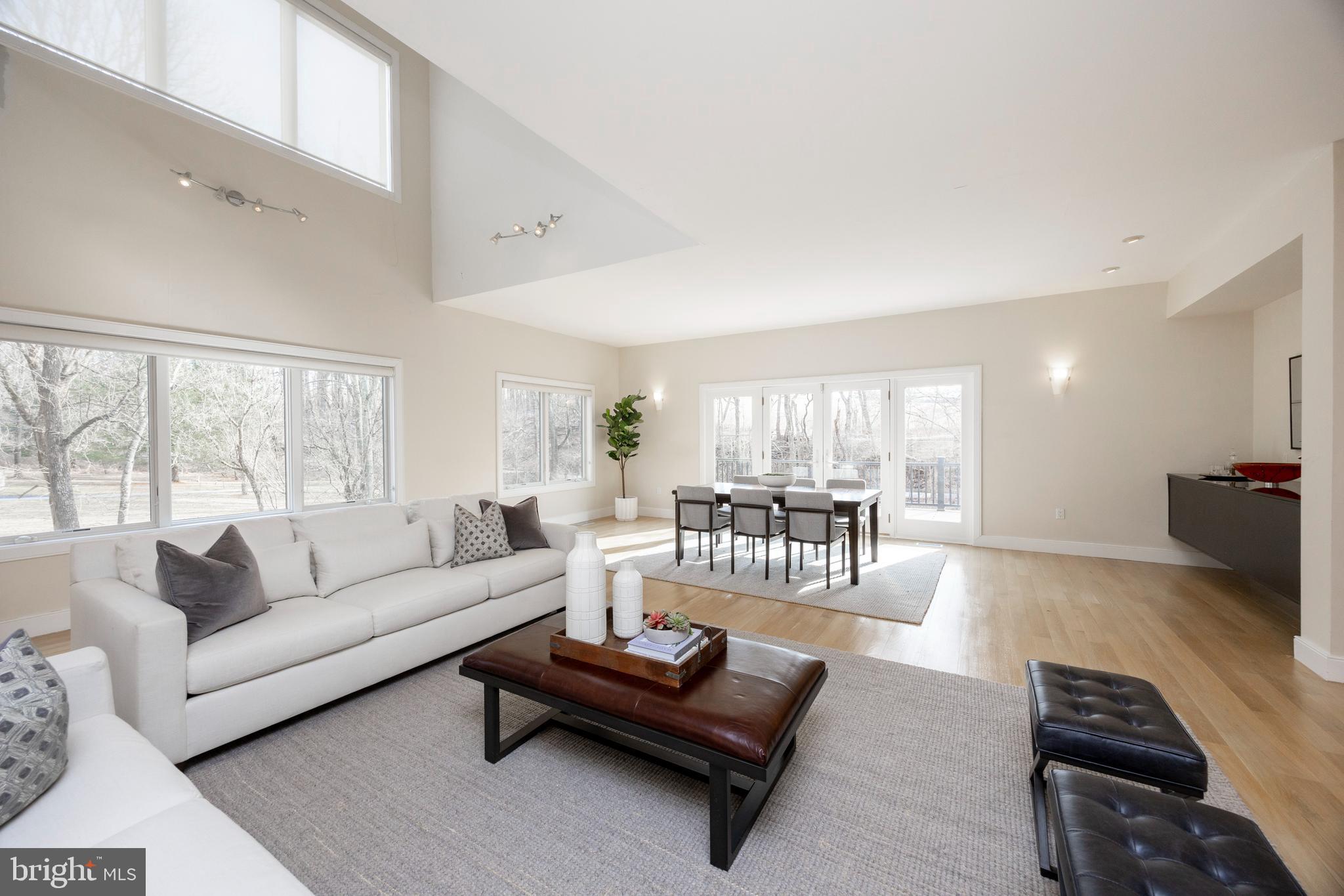115 Bullock Road Chadds Ford, PA 19317 - Photo 10 of 50 a living room with furniture and a large window