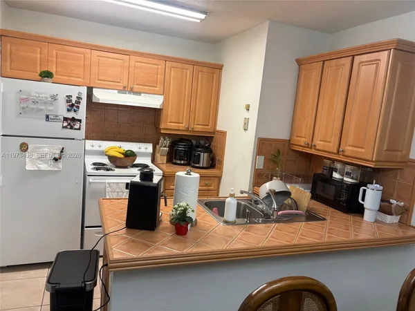 $228,000 | 18304 Northwest 68th Avenue, Unit C, Hialeah, FL 33015