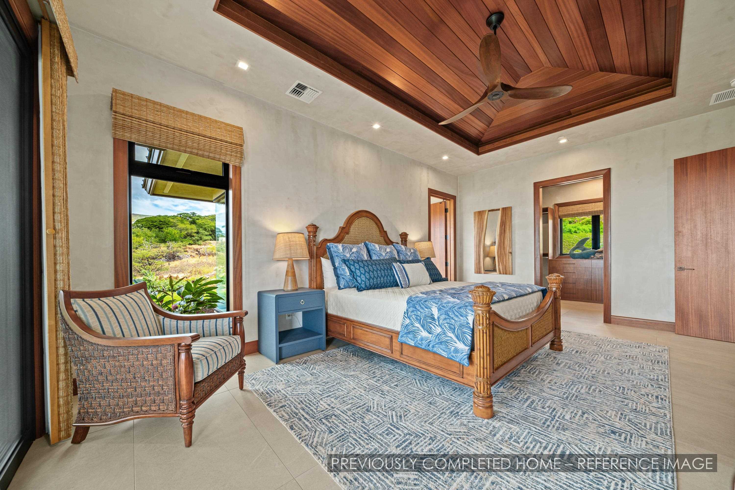 91 Kumu Niu Place, Unit A Lahaina, HI 96761 - Photo 12 of 48 a living room with furniture a rug and a window