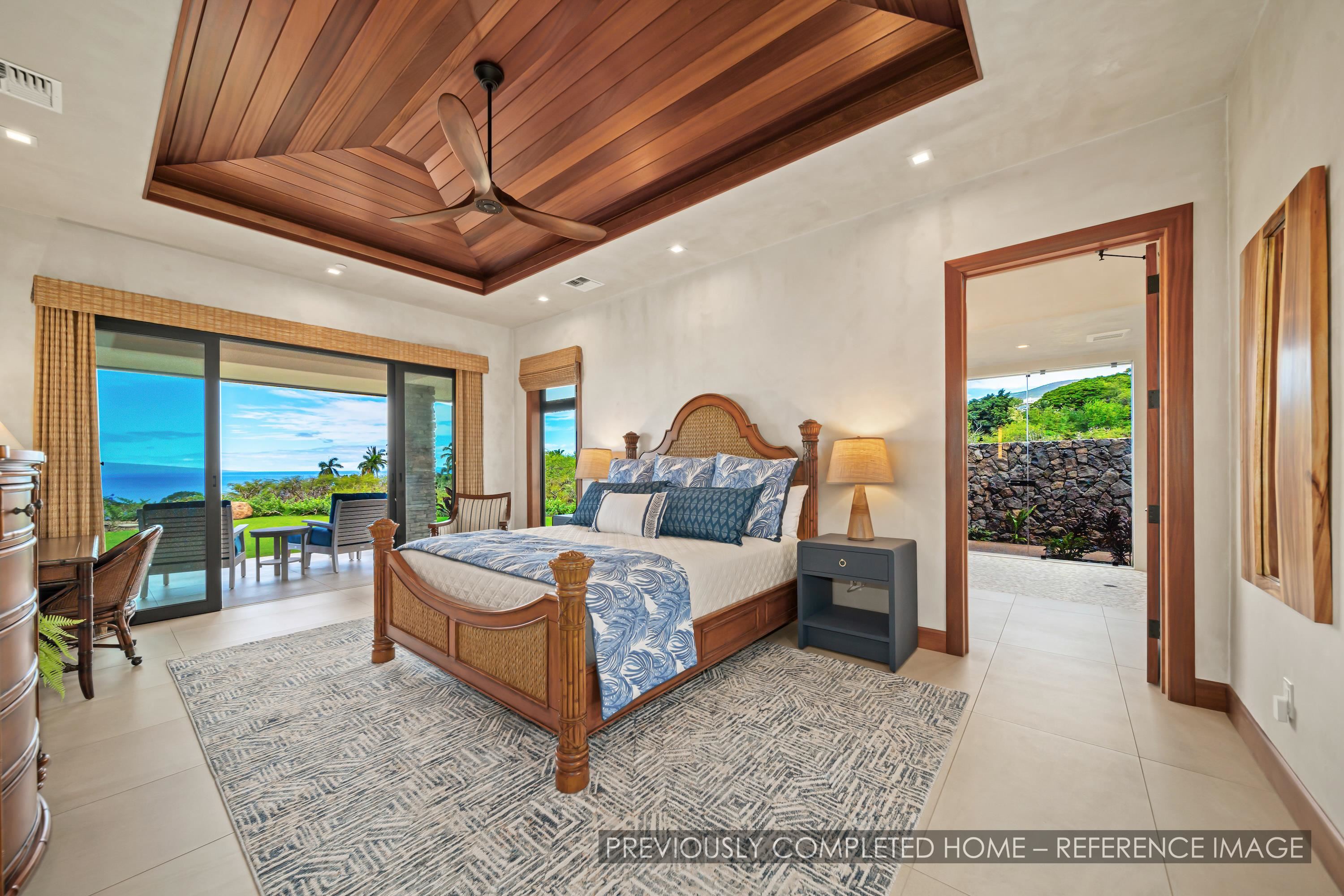 91 Kumu Niu Place, Unit A Lahaina, HI 96761 - Photo 13 of 48 a bed room with a bed and a chandelier