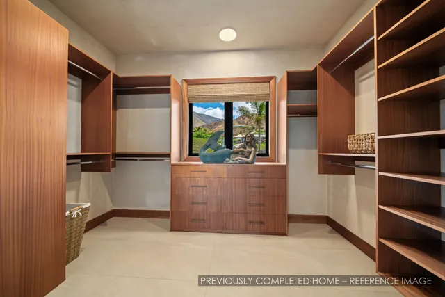 a large bathroom with a tub and window