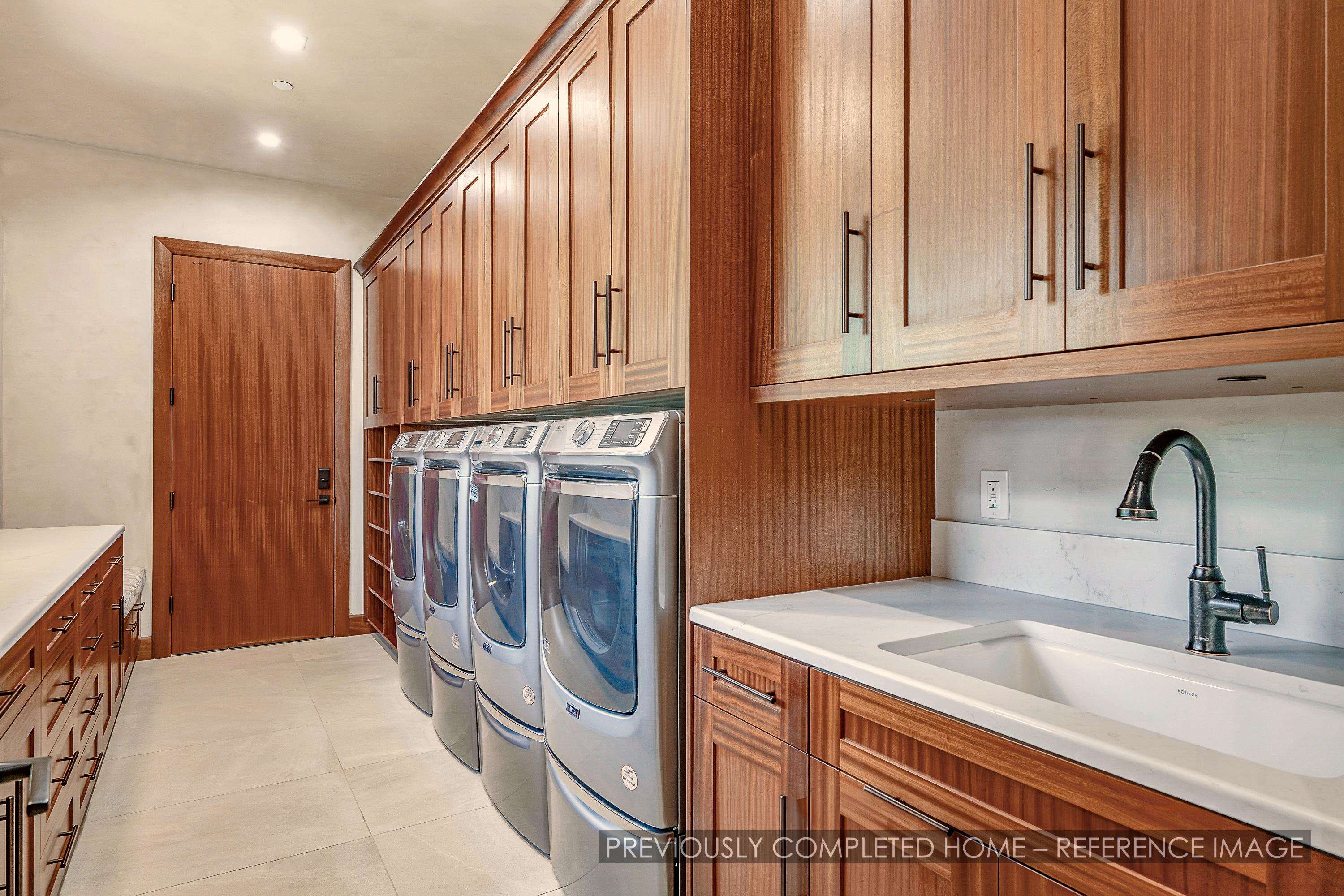 91 Kumu Niu Place, Unit A Lahaina, HI 96761 - Photo 19 of 48 a kitchen with a sink and cabinets