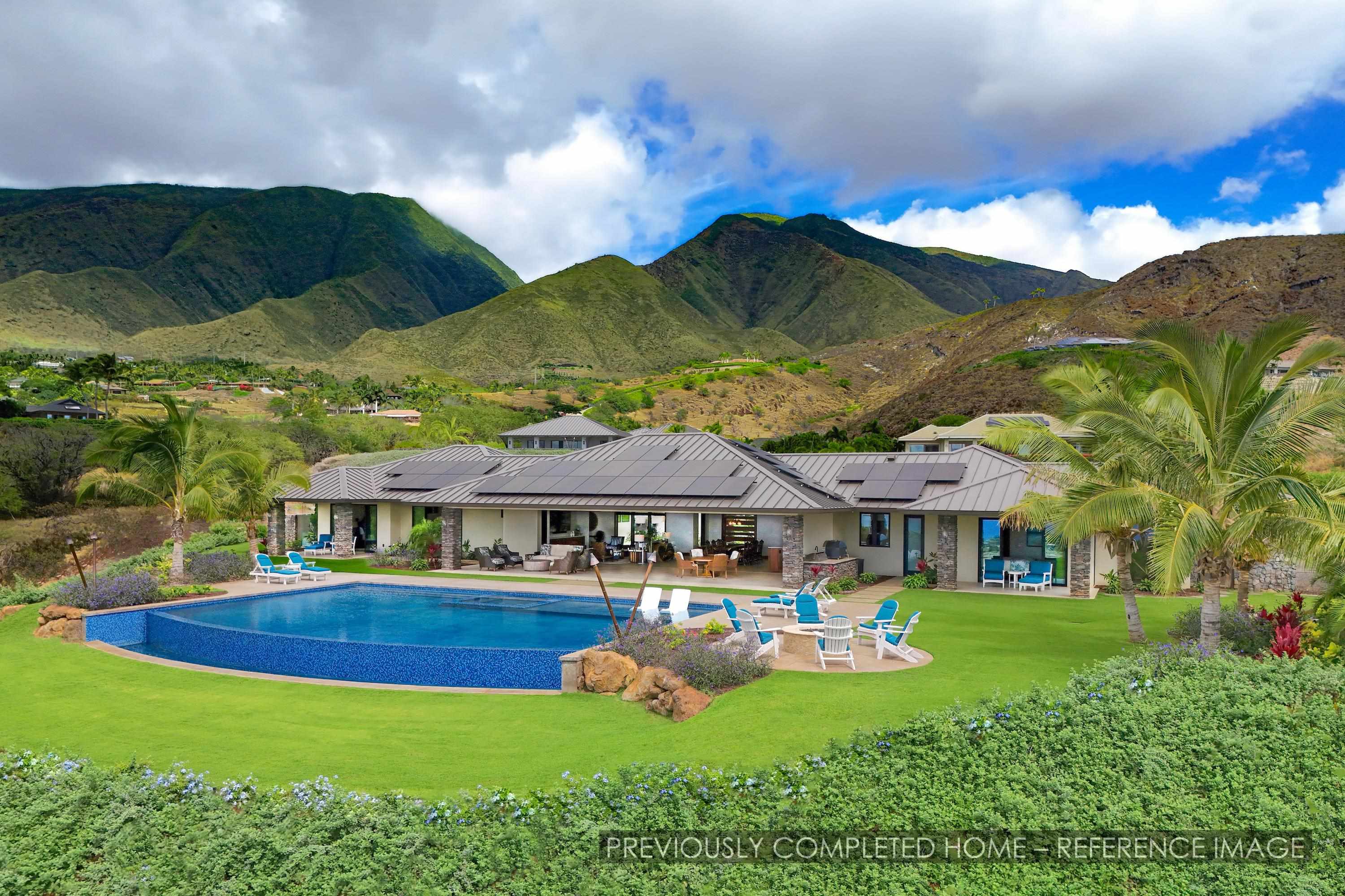 91 Kumu Niu Place, Unit A Lahaina, HI 96761 - Photo 29 of 48 a view of swimming pool with lawn chairs under an umbrella