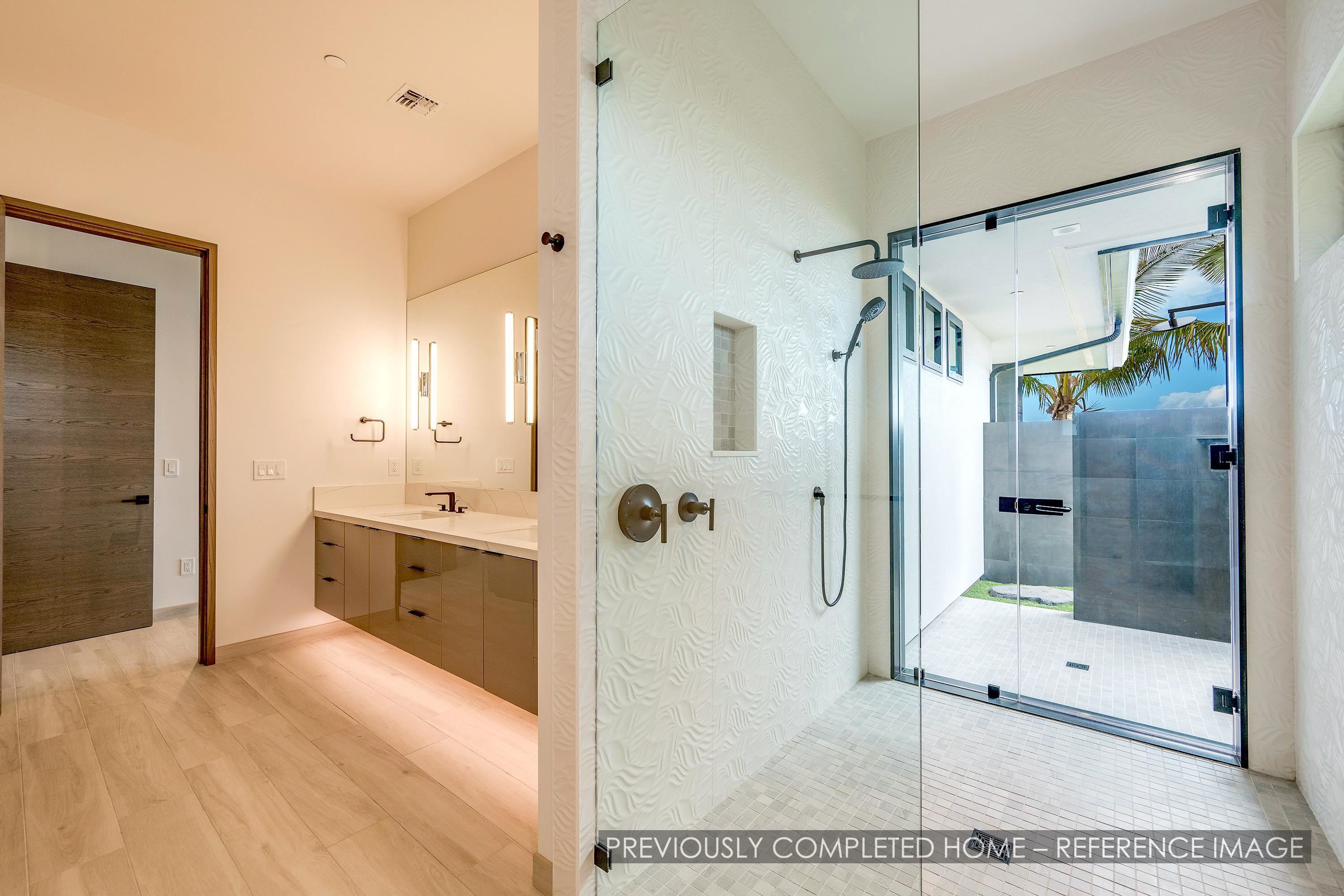 91 Kumu Niu Place, Unit A Lahaina, HI 96761 - Photo 34 of 48 a bathroom with a shower sink and mirror