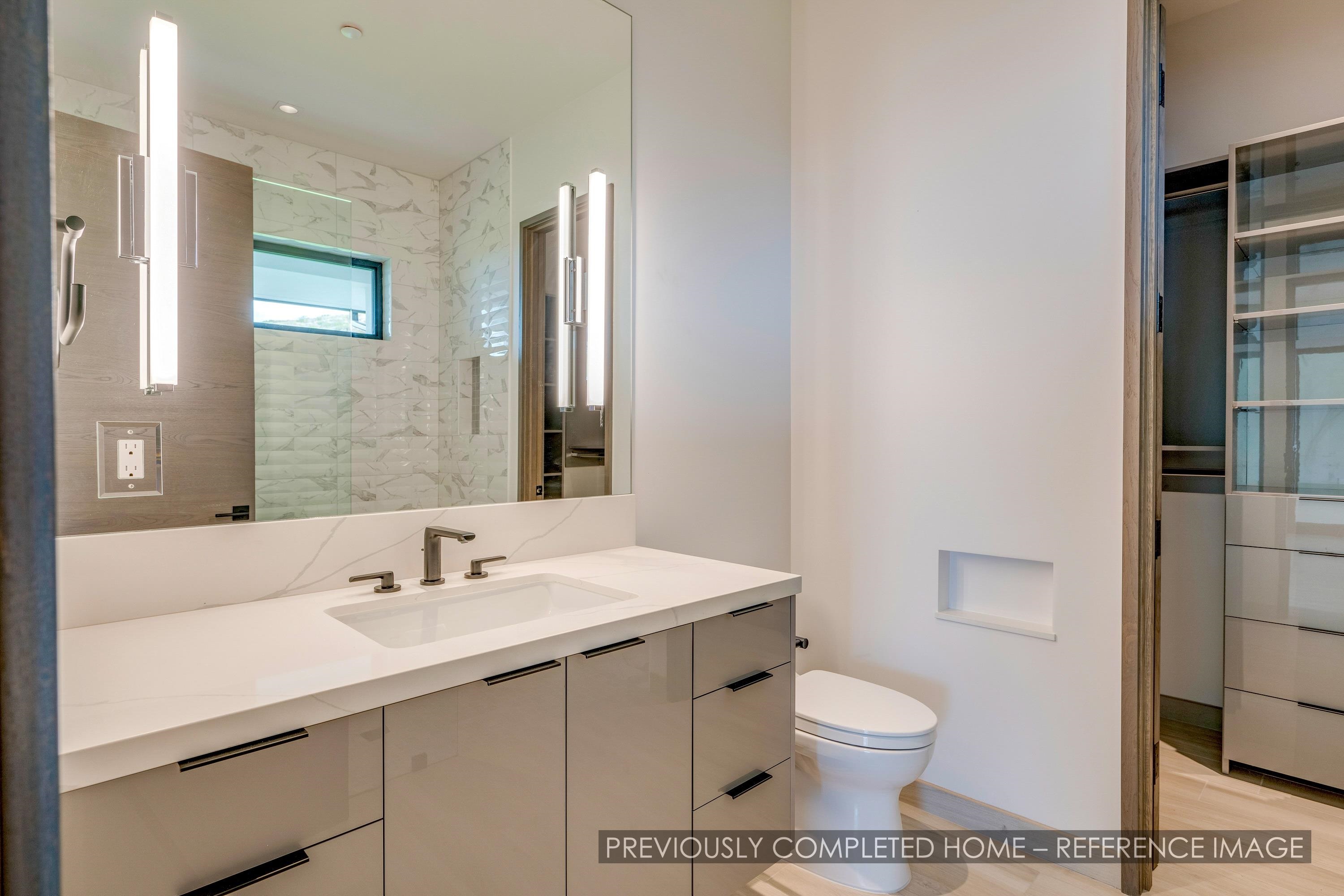 91 Kumu Niu Place, Unit A Lahaina, HI 96761 - Photo 38 of 48 a bathroom with a sink toilet and shower