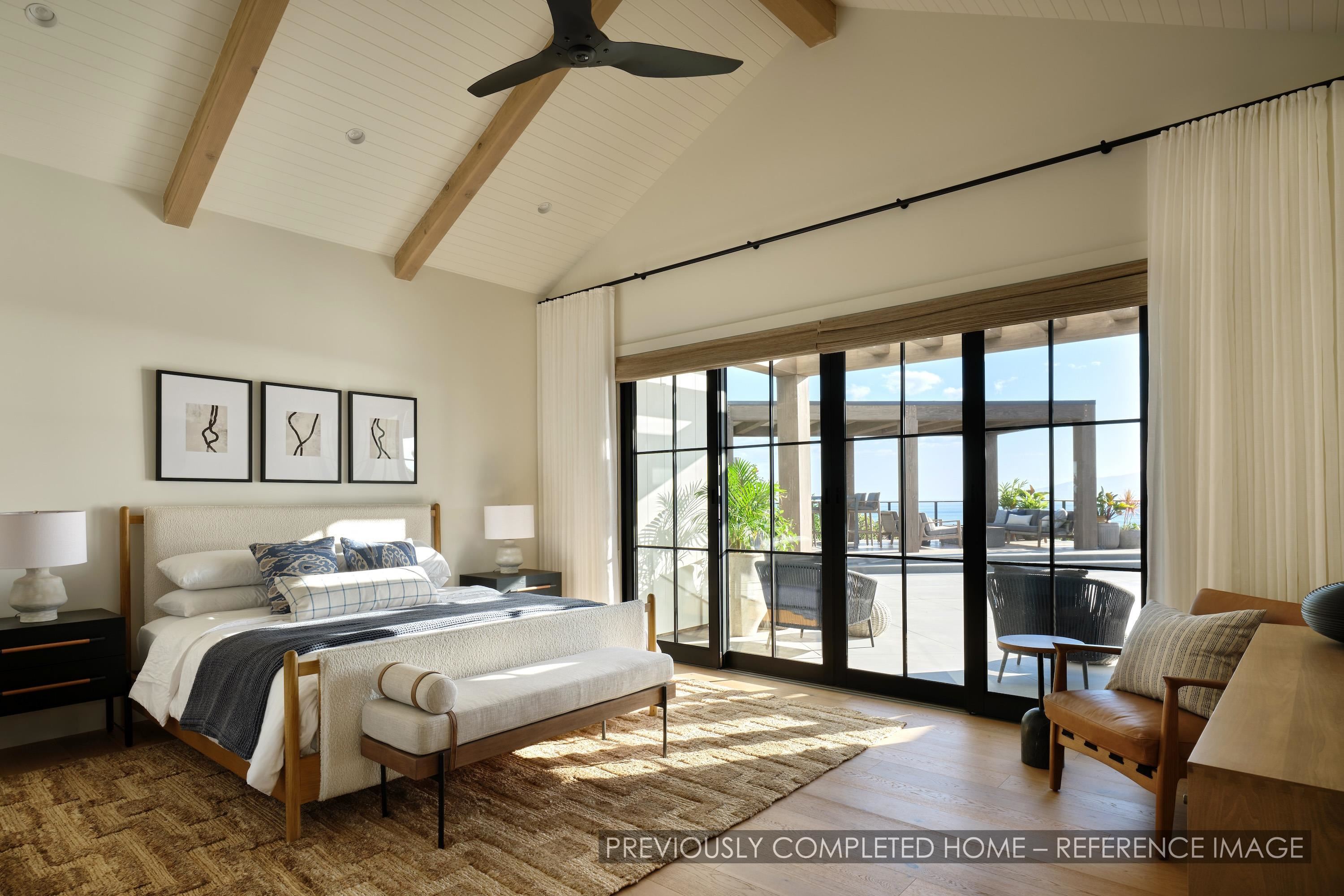 91 Kumu Niu Place, Unit A Lahaina, HI 96761 - Photo 7 of 48 a bedroom with a bed and glass window