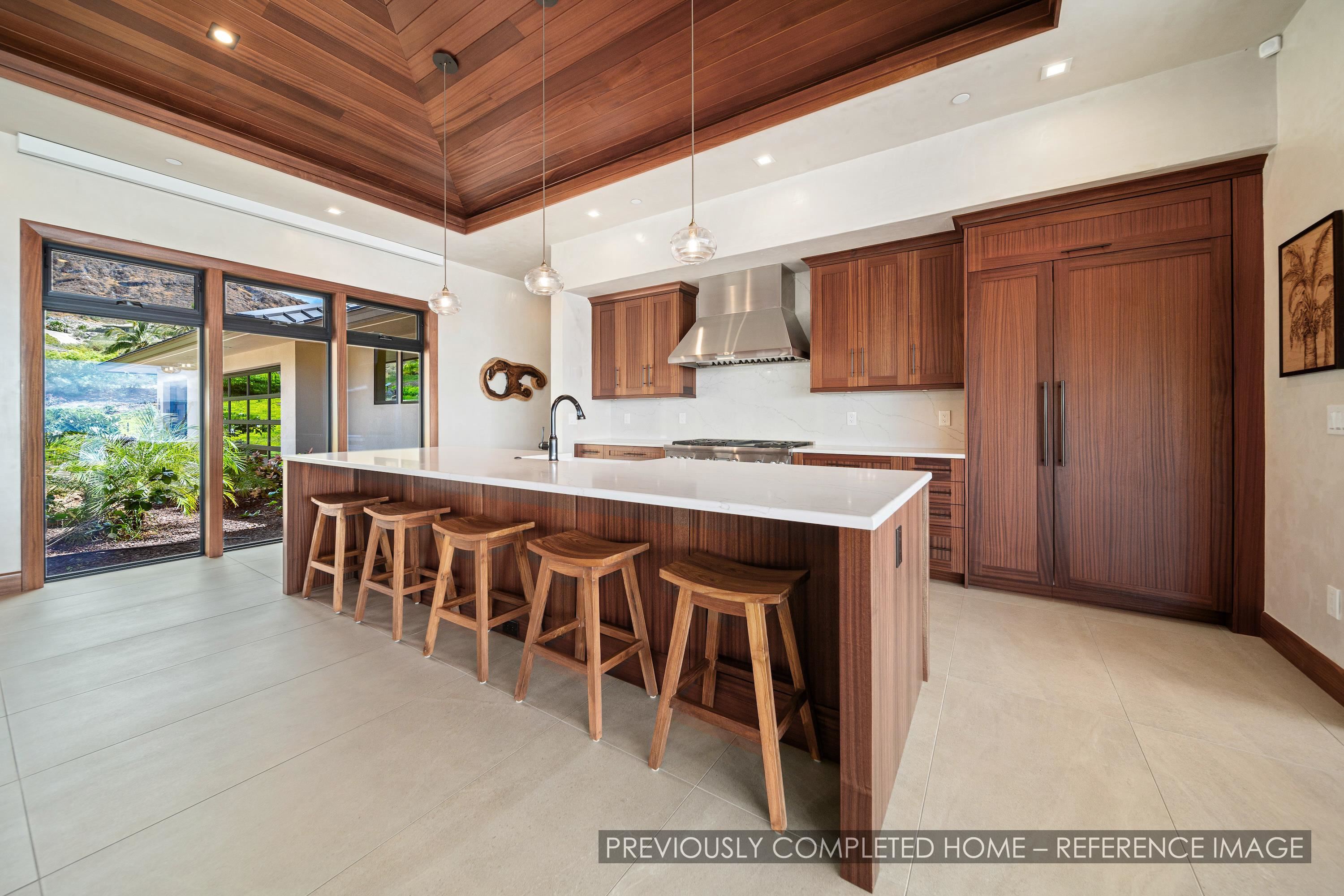 91 Kumu Niu Place, Unit A Lahaina, HI 96761 - Photo 10 of 48 a dining hall with stainless steel appliances granite countertop a stove and a refrigerator