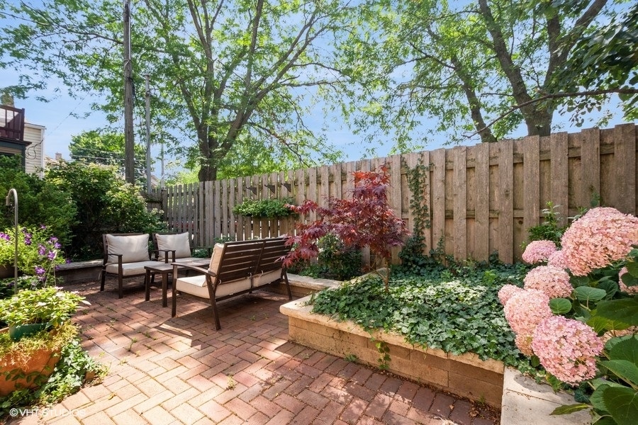 524 Hamilton Street Evanston, IL 60202 - Photo 2 of 32 a view of a bench in a garden