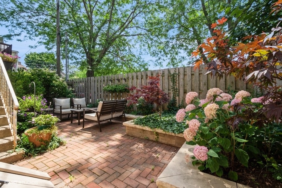 524 Hamilton Street Evanston, IL 60202 - Photo 22 of 32 a view of a backyard with sitting area and furniture