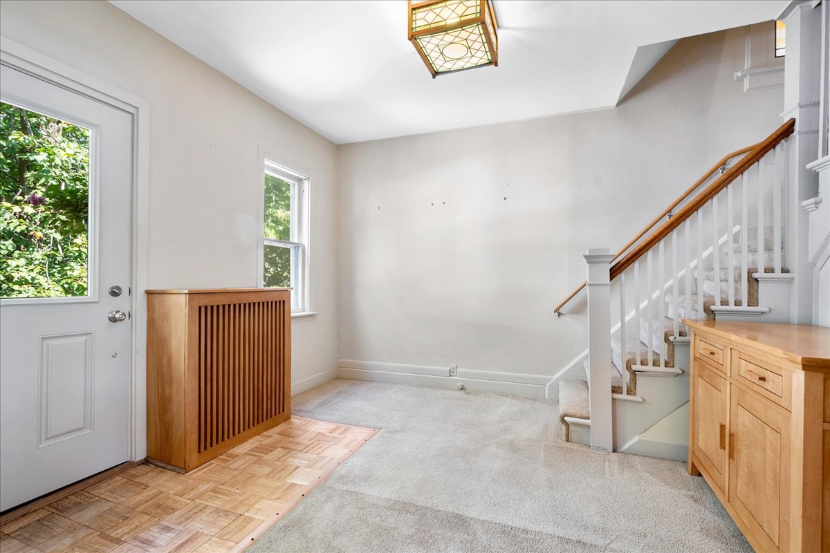 524 Hamilton Street Evanston, IL 60202 - Photo 3 of 32 a view of entryway with stairs and wooden floor