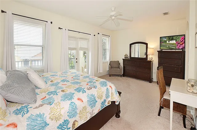 a bedroom with a bed and furniture