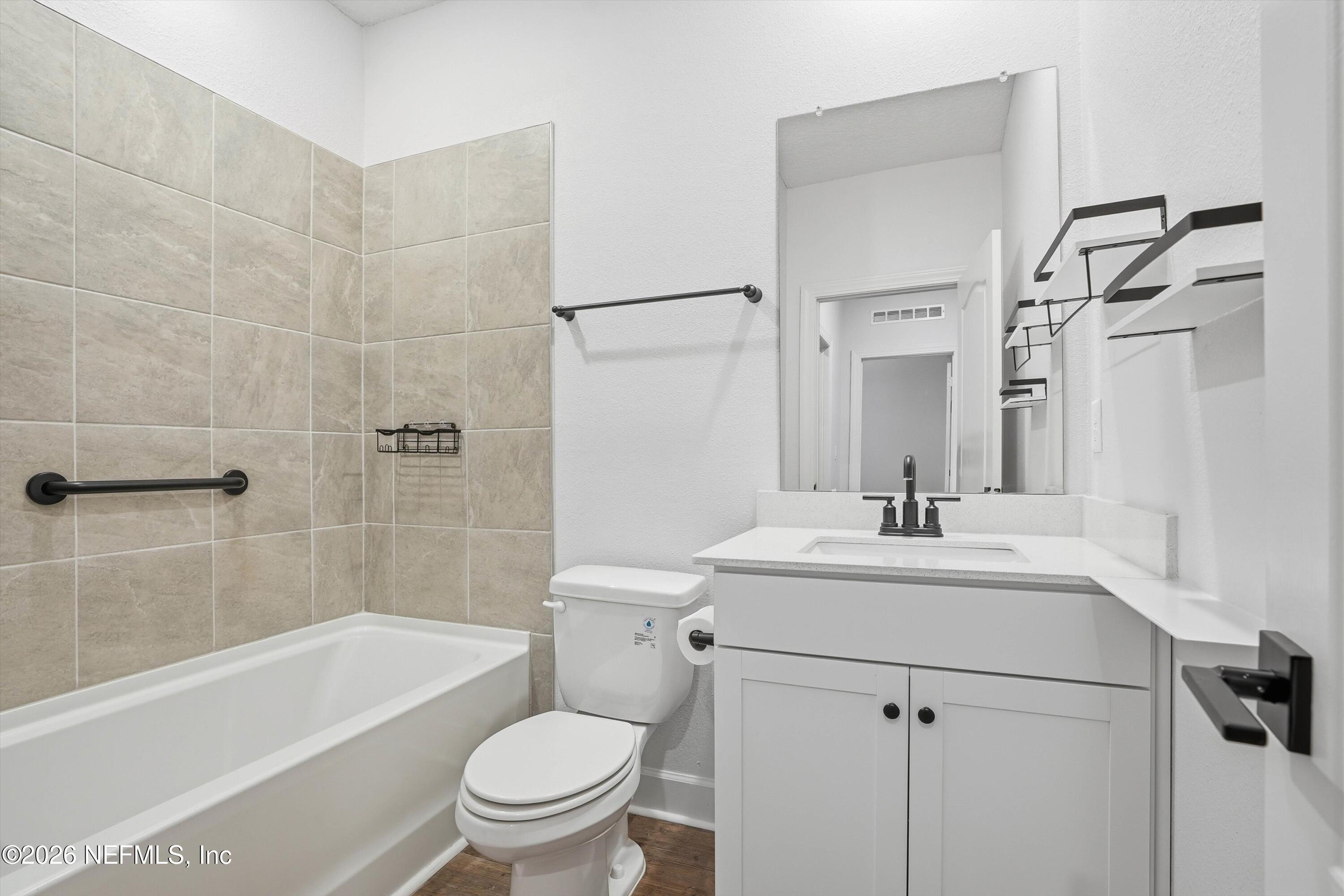 600 Morgans Treasure Road St. Augustine, FL 32084 - Photo 17 of 41 a bathroom with a sink a toilet and a bathtub