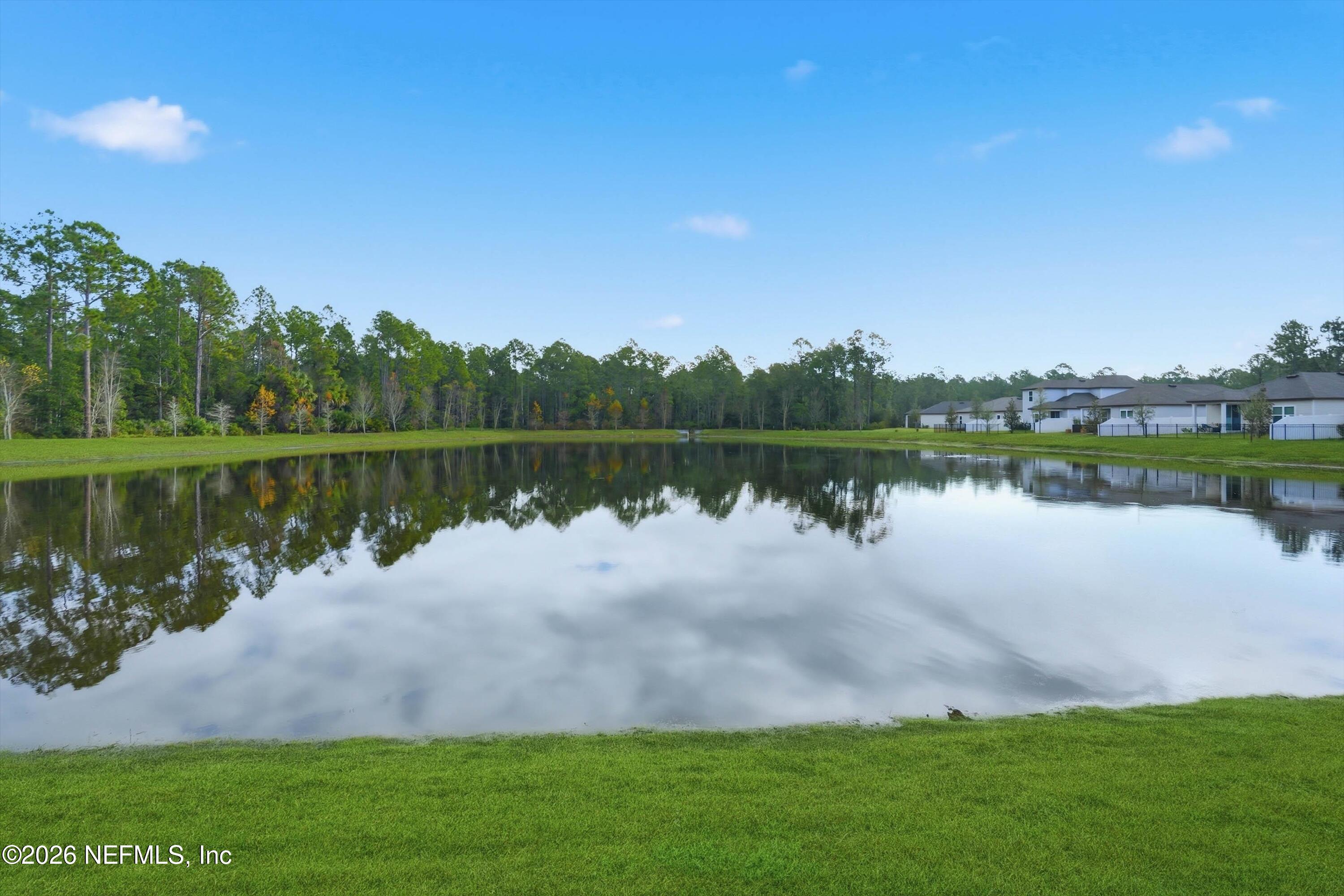 600 Morgans Treasure Road St. Augustine, FL 32084 - Photo 22 of 41 a lake view with a big yard and palm trees