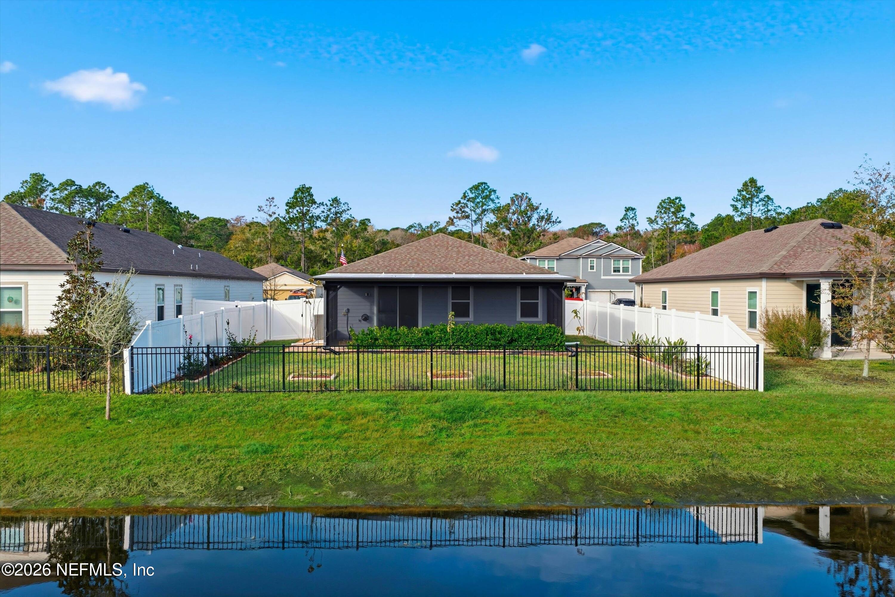 600 Morgans Treasure Road St. Augustine, FL 32084 - Photo 25 of 41 a view of house with a big yard