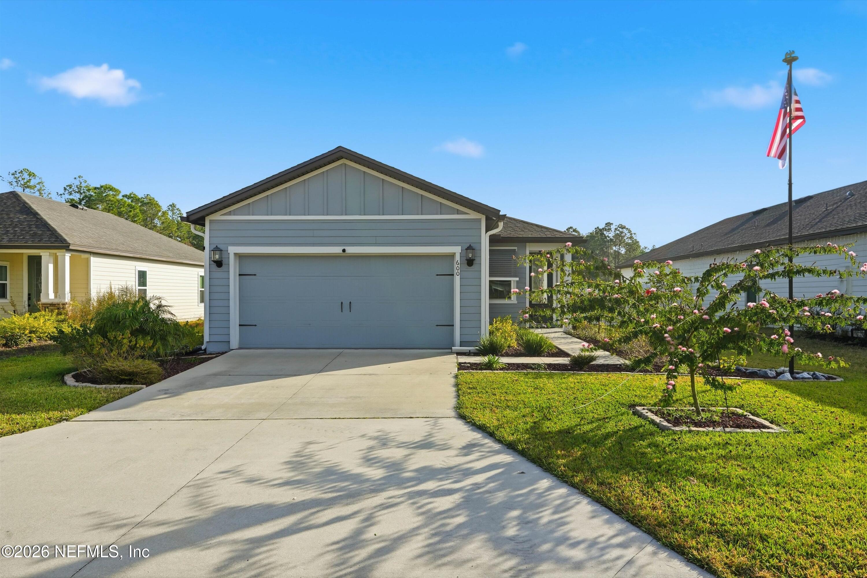 600 Morgans Treasure Road St. Augustine, FL 32084 - Photo 32 of 41 a front view of a house with yard