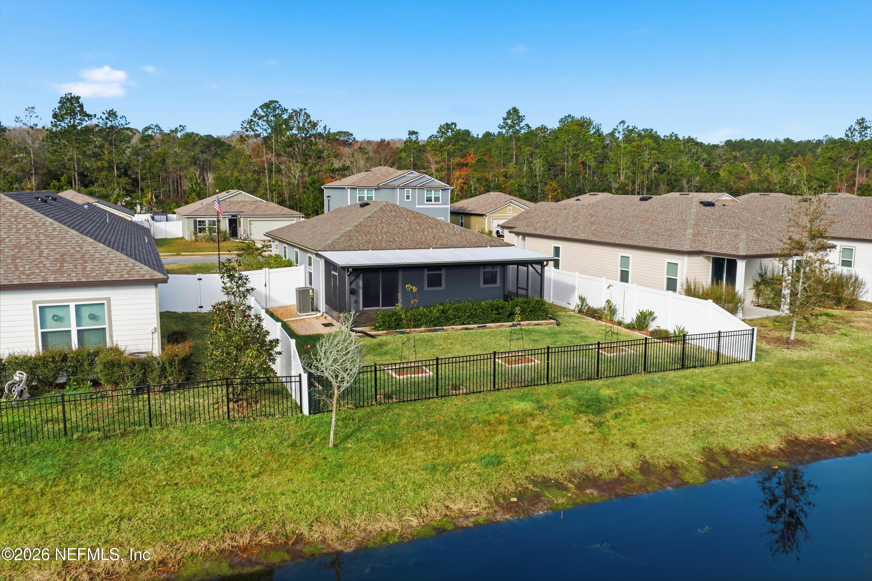 600 Morgans Treasure Road St. Augustine, FL 32084 - Photo 41 of 41 a aerial view of a house with a big yard