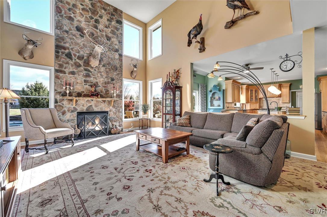 330 Manor Drive Nazareth, PA 18064 - Photo 14 of 51 a living room with furniture fireplace and a fireplace