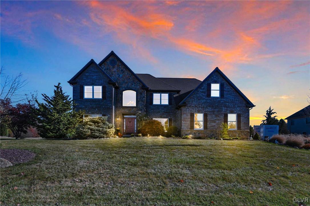 330 Manor Drive Nazareth, PA 18064 - Photo 49 of 51 a front view of a house with a yard