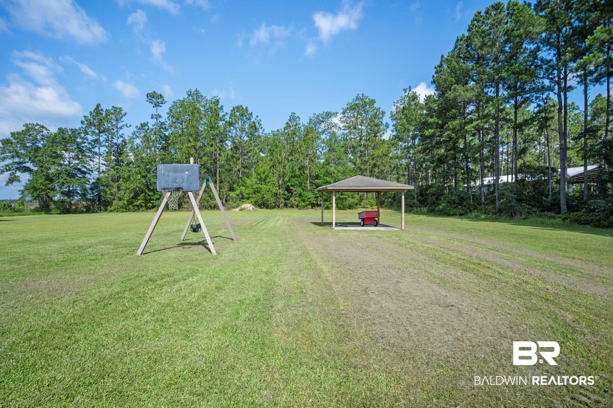 48513 Phillipsville Road Bay Minette, AL 36507 - Photo 49 of 50 View of grassy yard with a gazebo